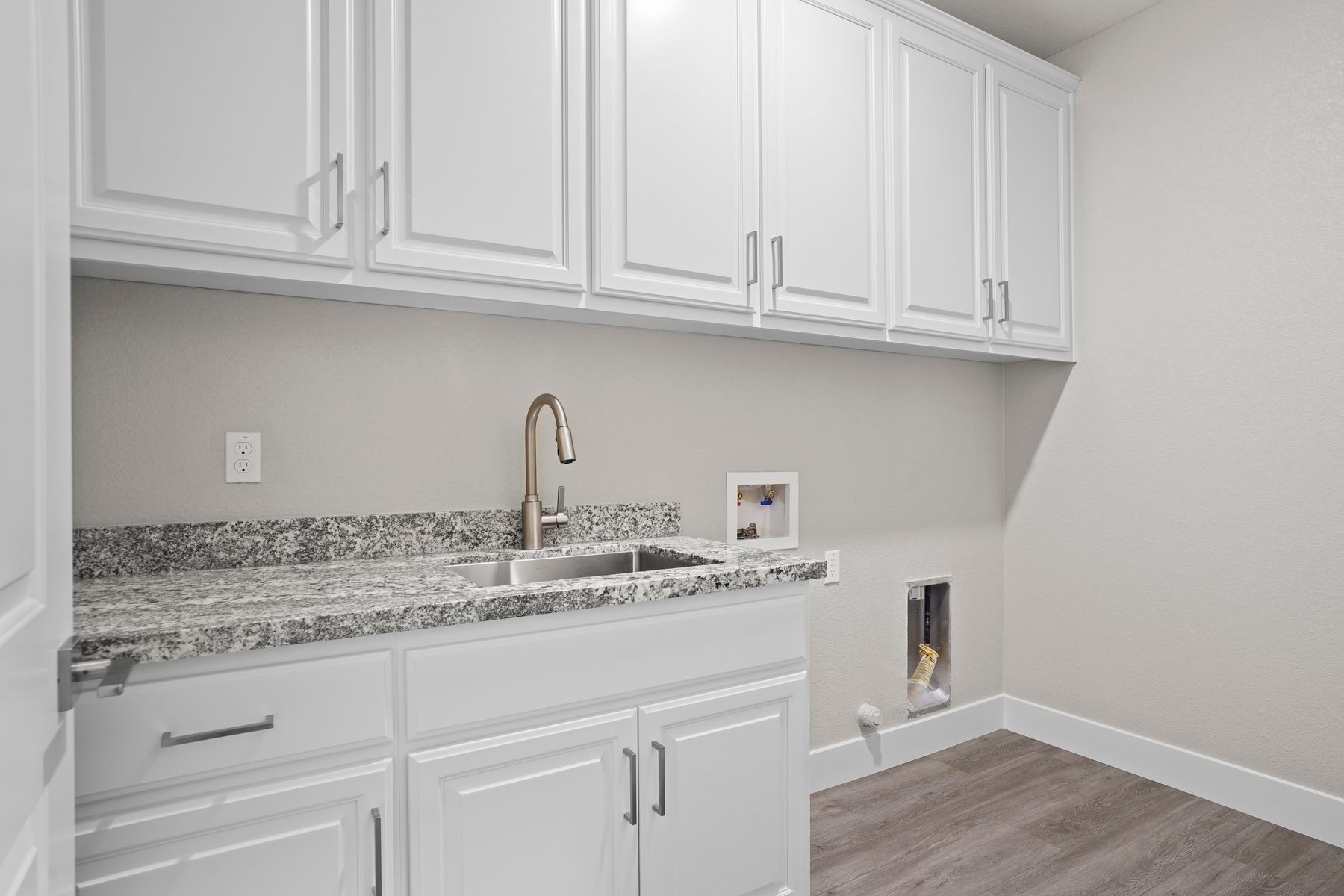 The home also has the perfect fit for a washer and dryer unite