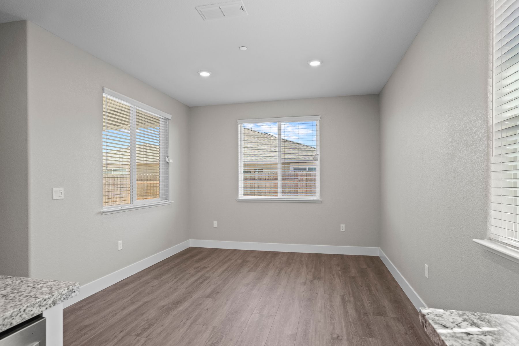 The dining room is attached to the other side of the kitchen, making it a perfect place to enjoy meals