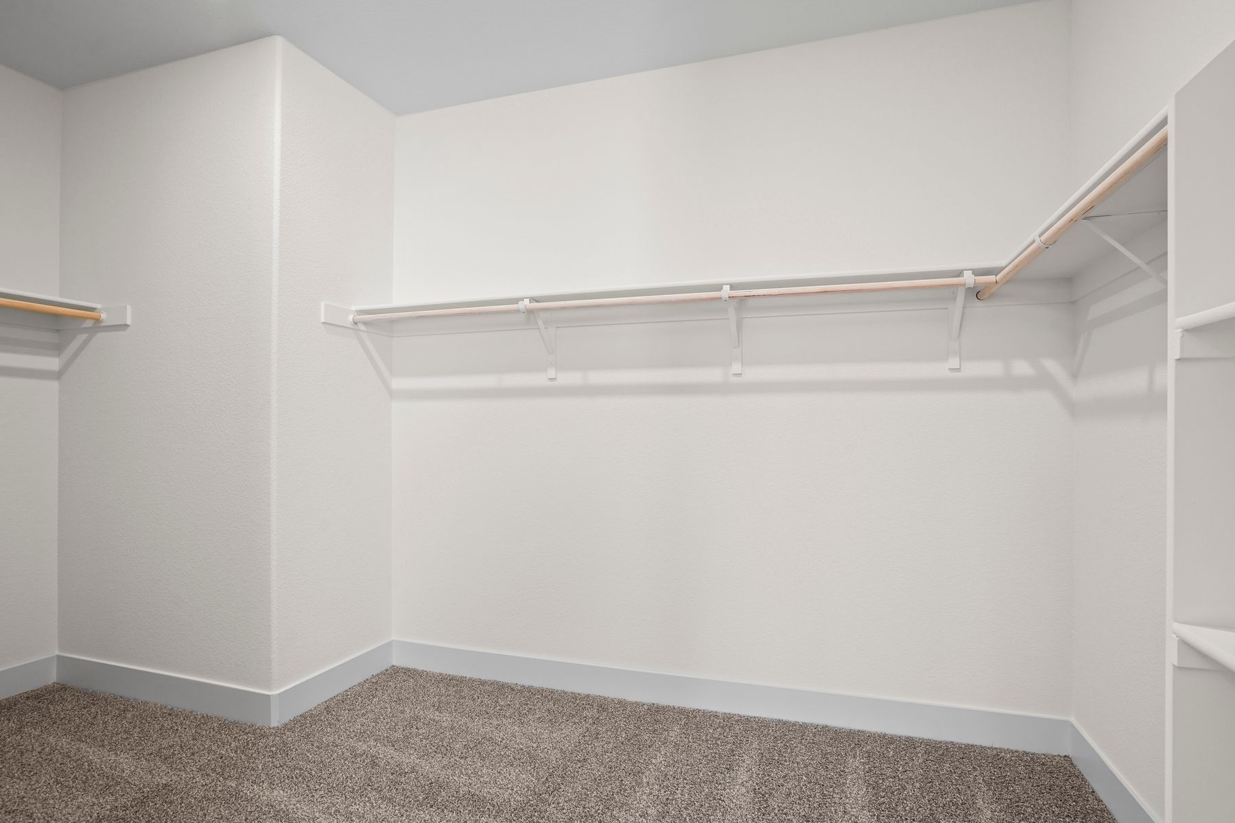 The bedroom offers a large walk-in closet 