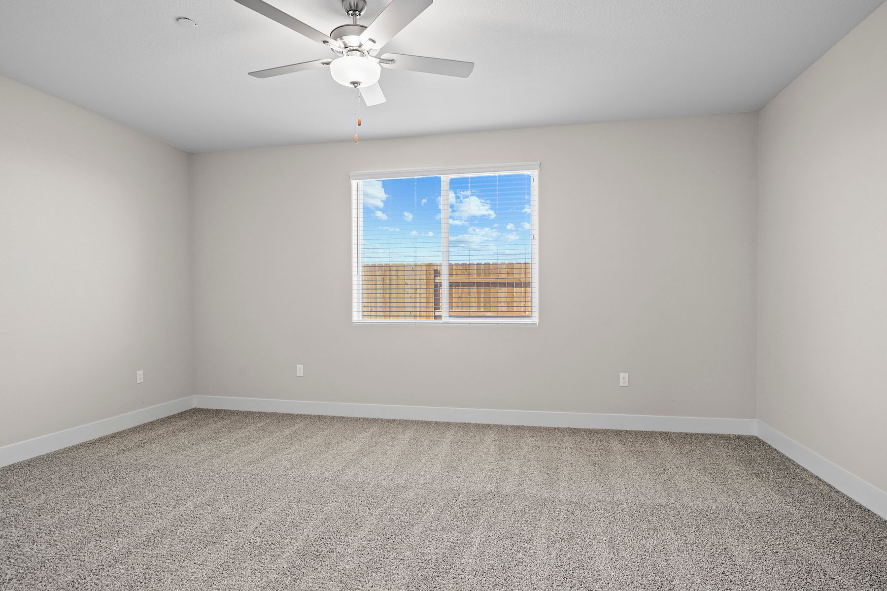 This bedroom has beautiful natural lighting