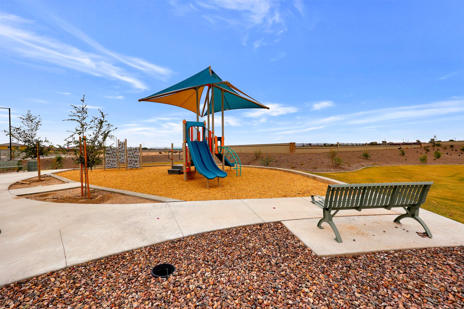 The park has multiple benches making it the perfect place to watch your kid play.