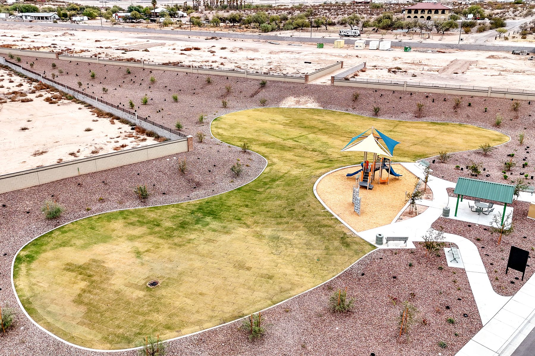The park is comprised of spacious green space and a playground perfect for kids of all ages.