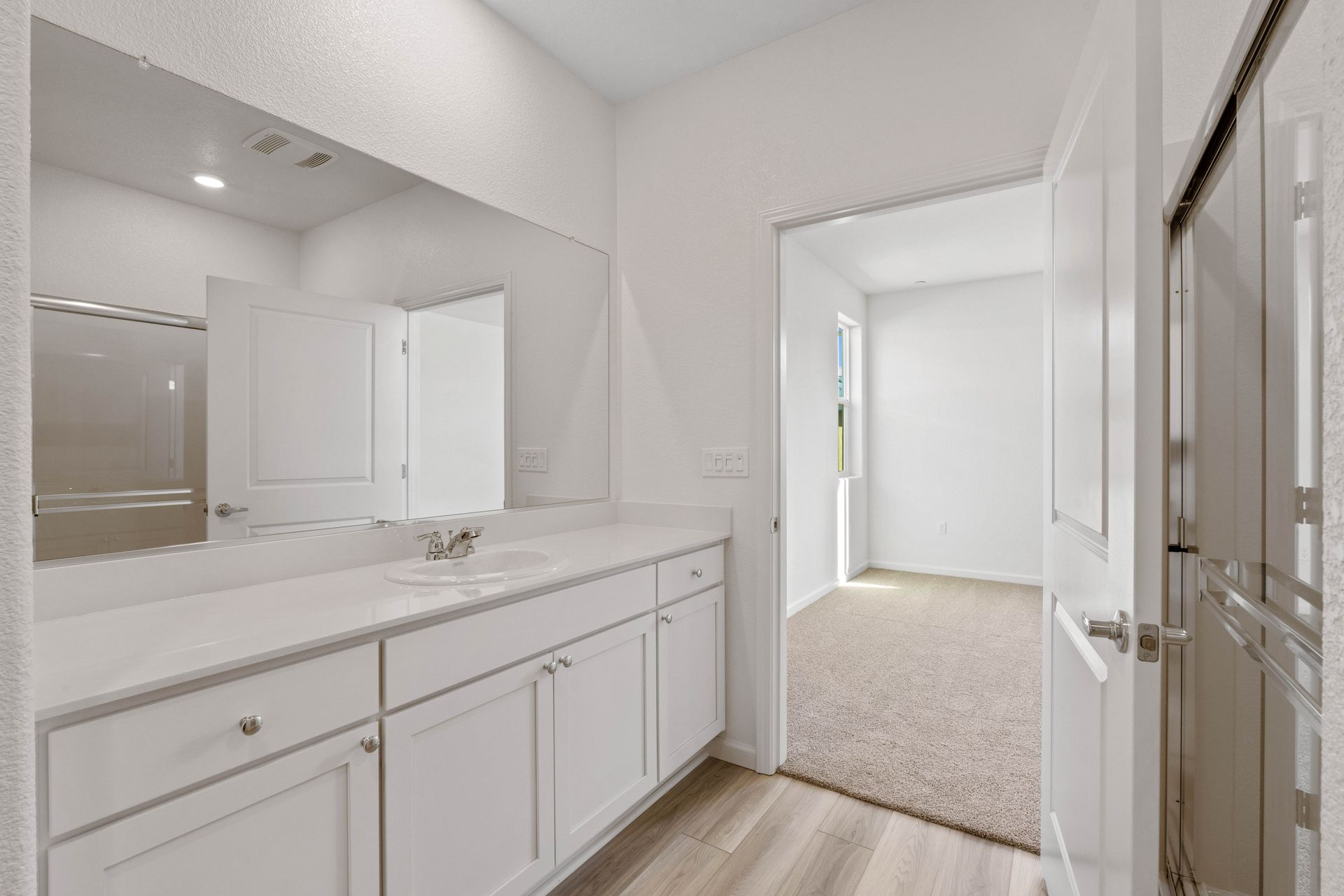 The master bath has a stunning vanity!