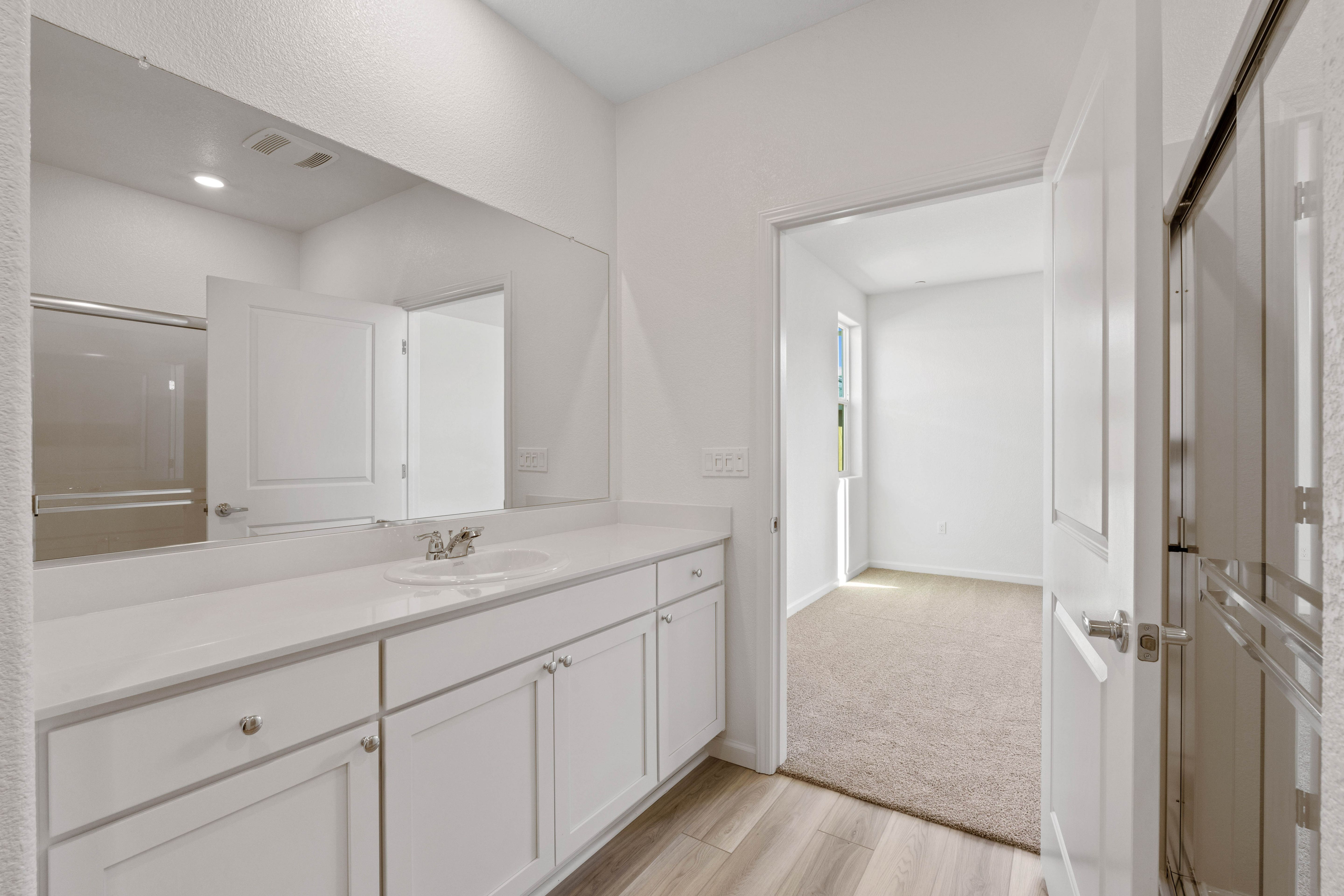 The master bath has a stunning vanity!