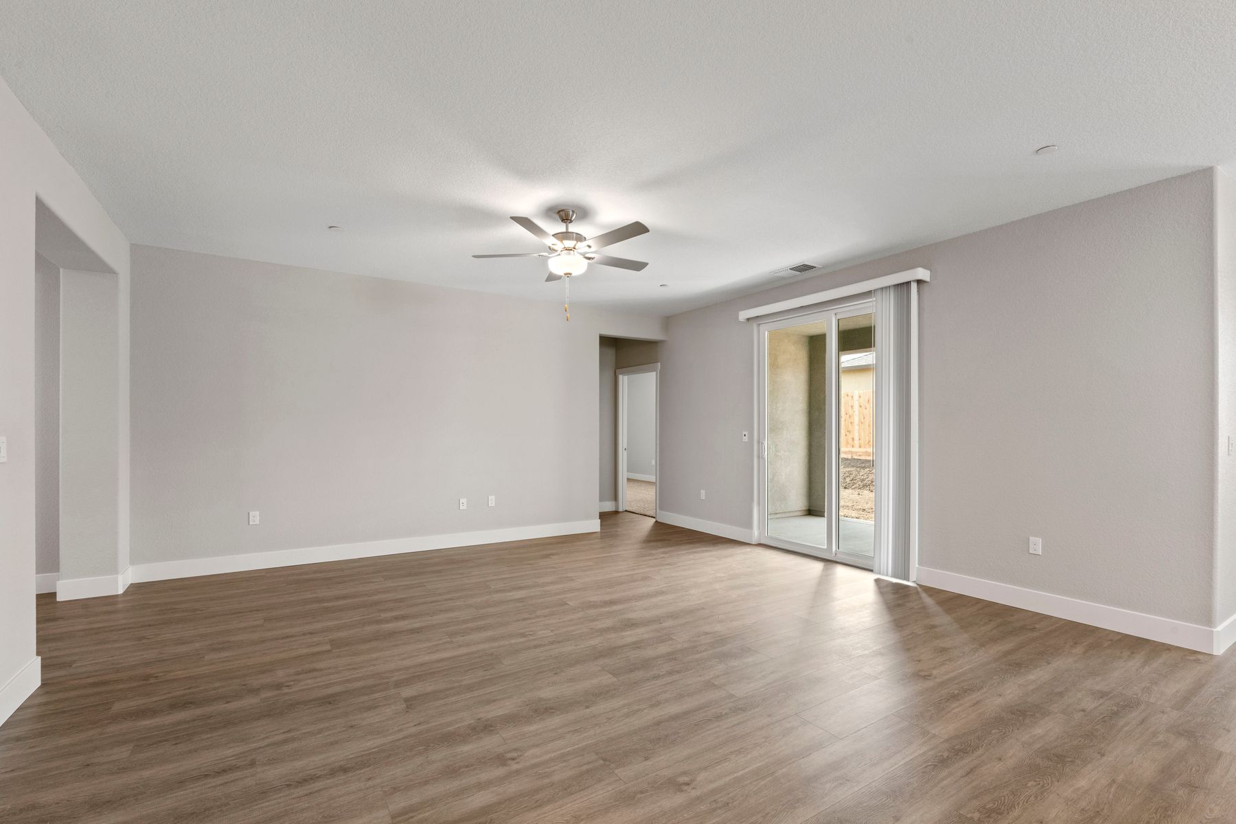 This family room opens to backyard patio.