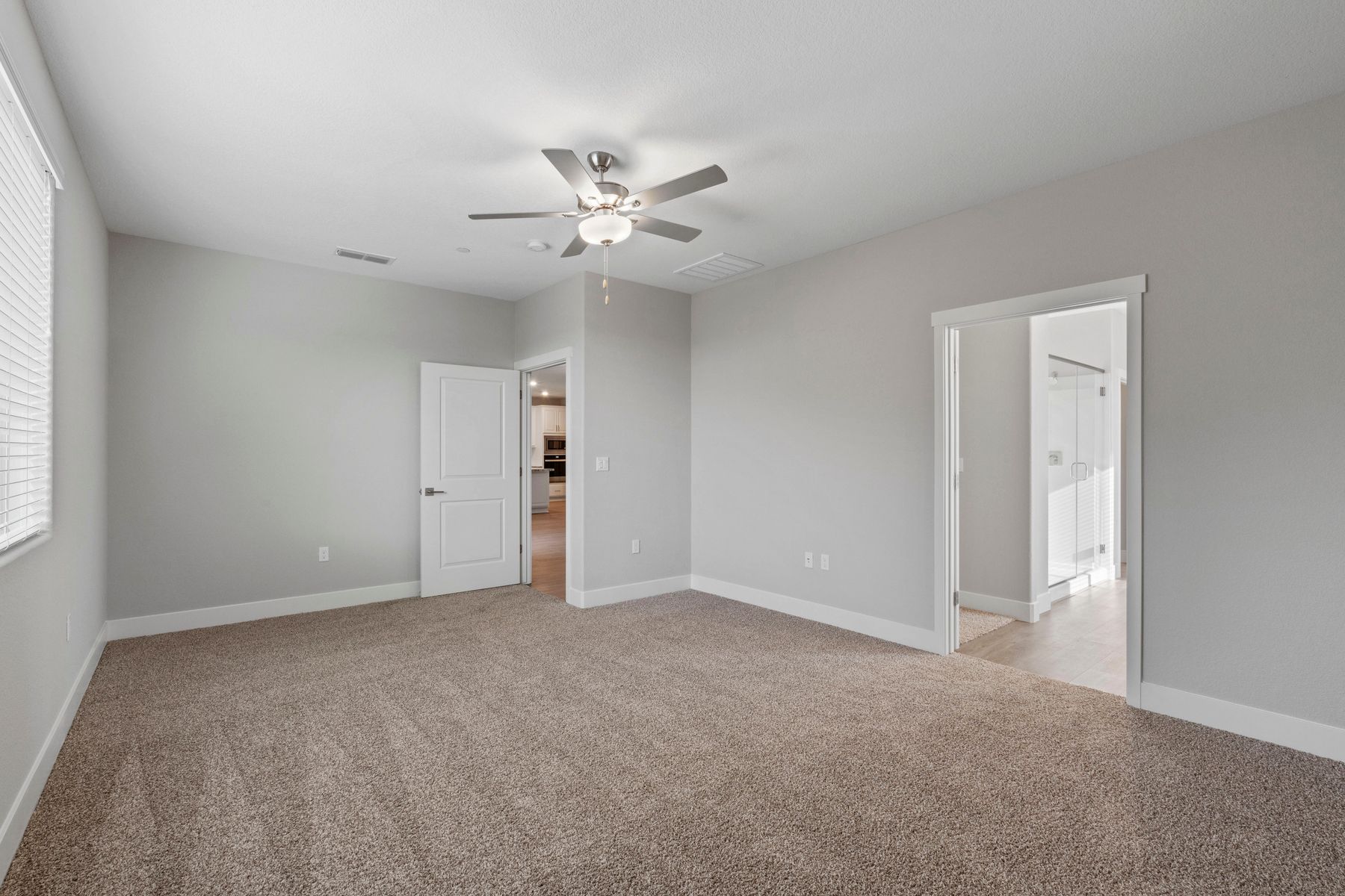 The master suite of this home has plenty of space!
