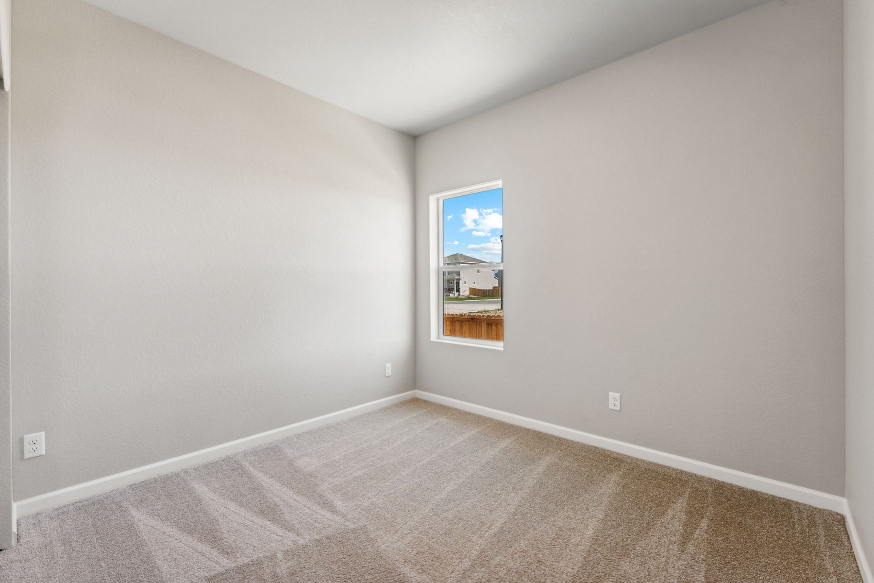 The secondary bedroom has carpet.