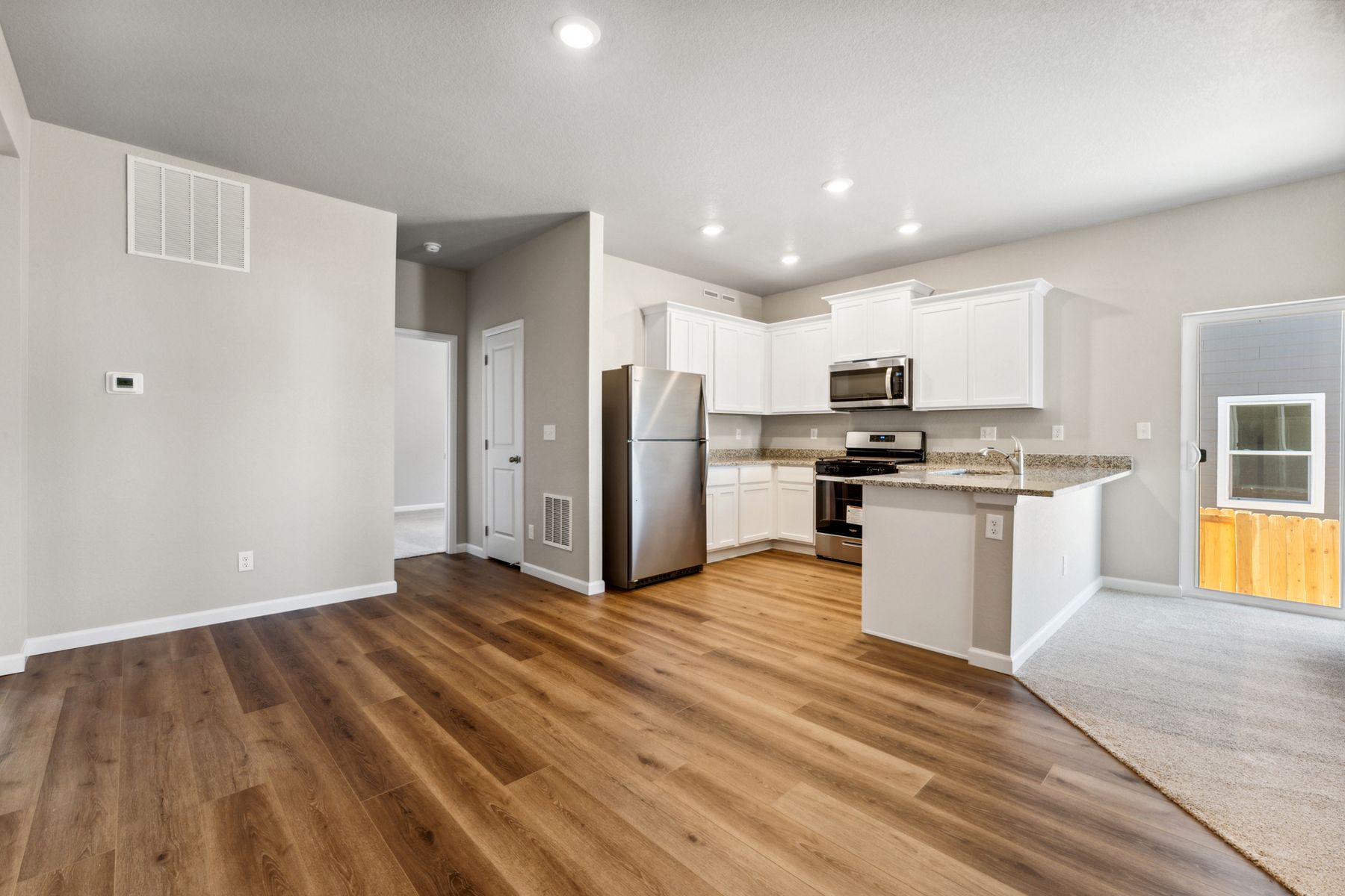 The kitchen is chef ready and is connected to the dining room.