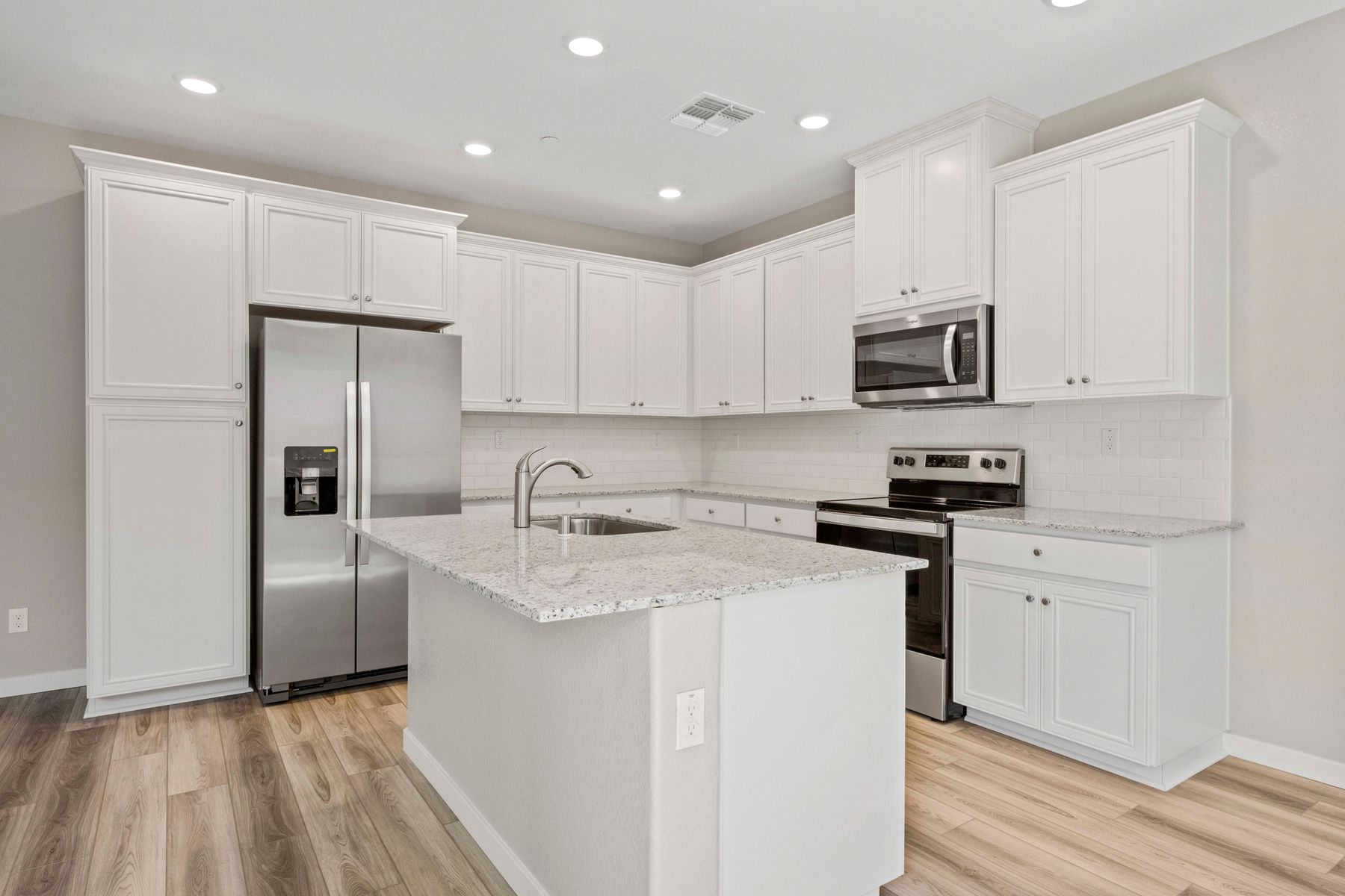 Every home at Velare at Twelve Bridges includes a full suite of kitchen appliances by Whirlpool!