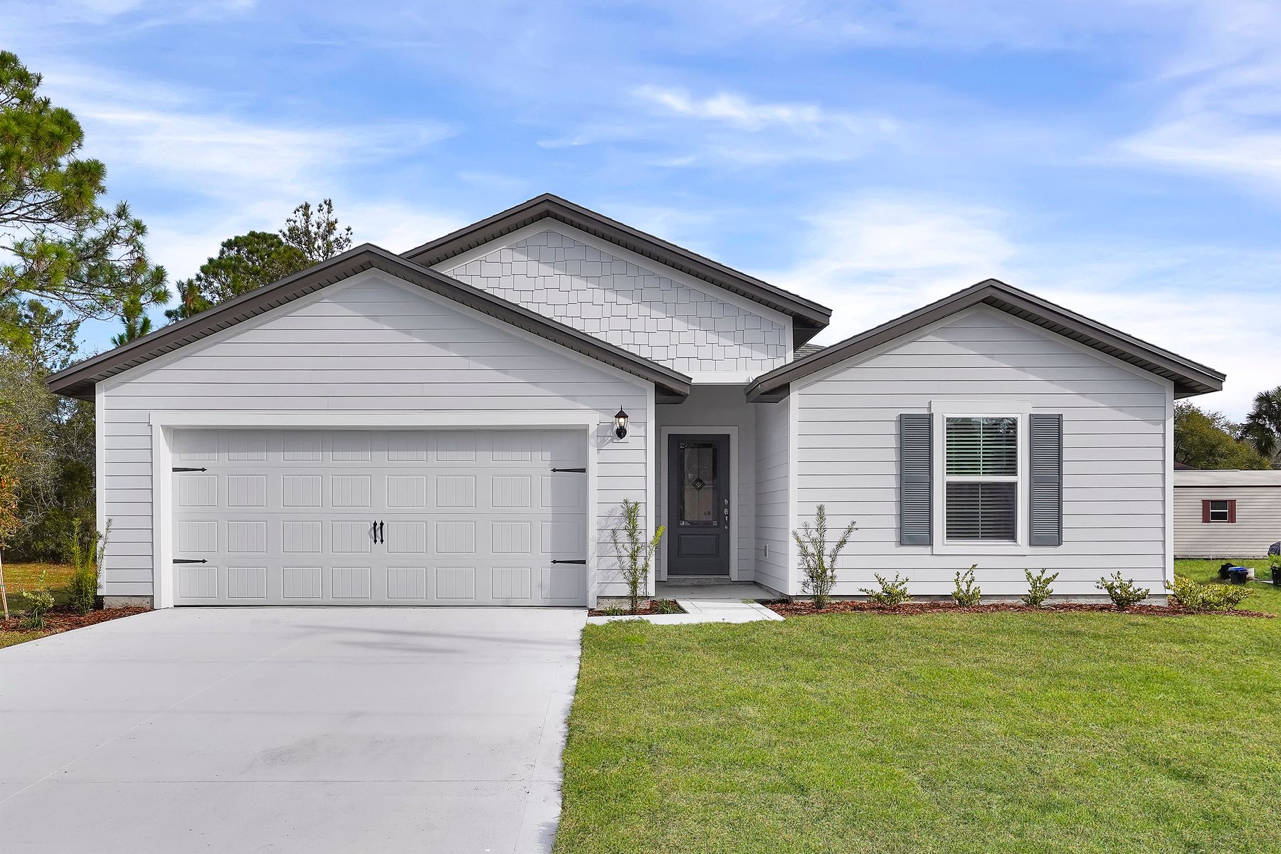 This home has a charming exterior and a 2-car garage!