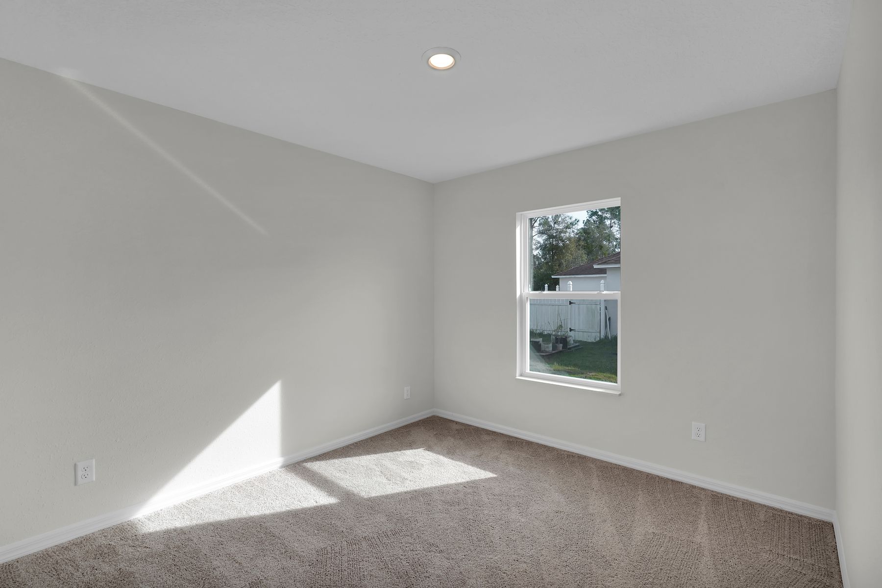 Each bedroom in the Caprice includes tan carpets, gorgeous windows, and a closet!