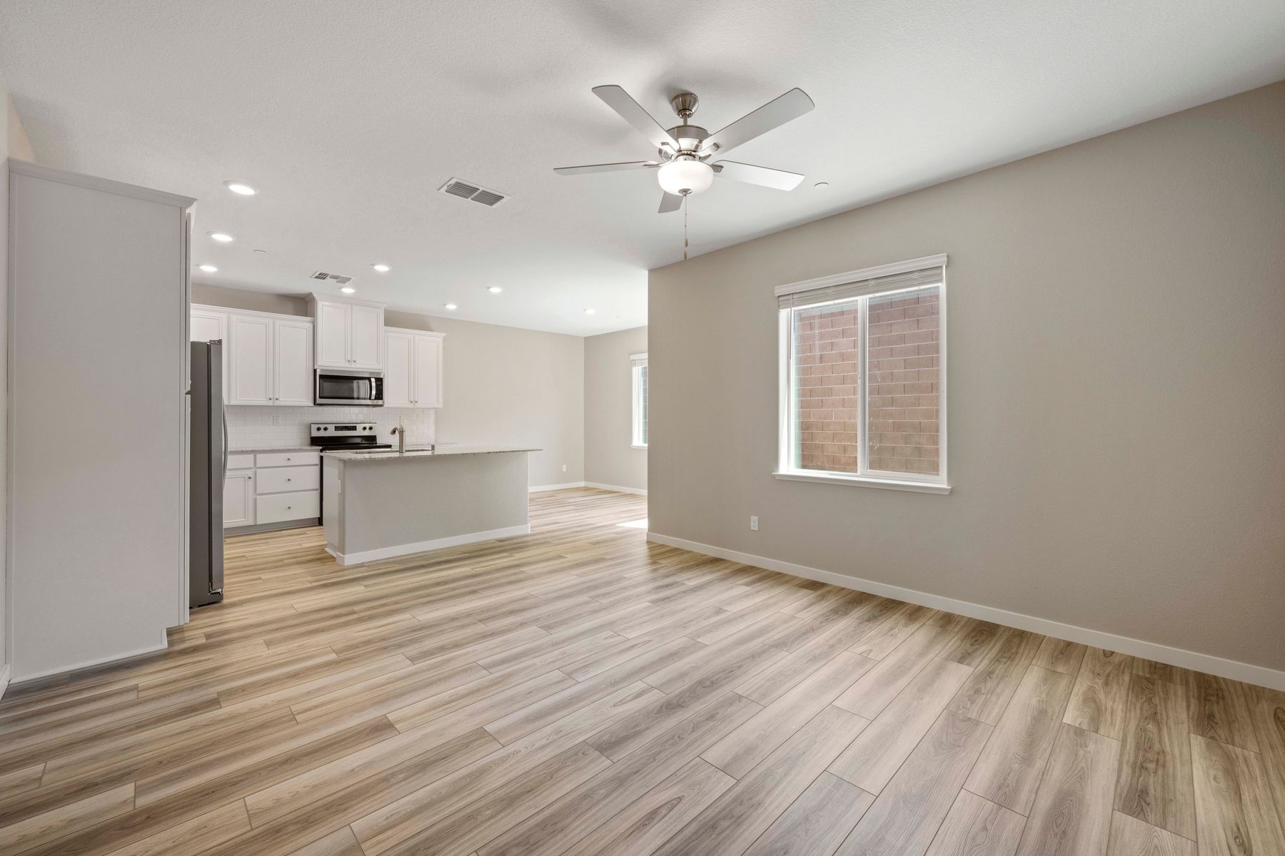 The Willow has an open layout with the kitchen open to the family room and dining room.