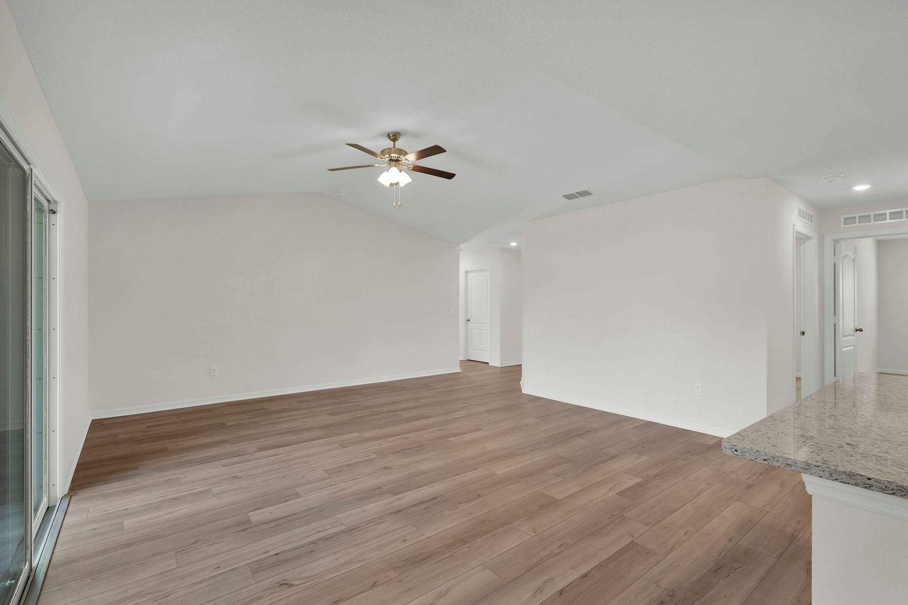 The dining room is open to the kitchen and family room.