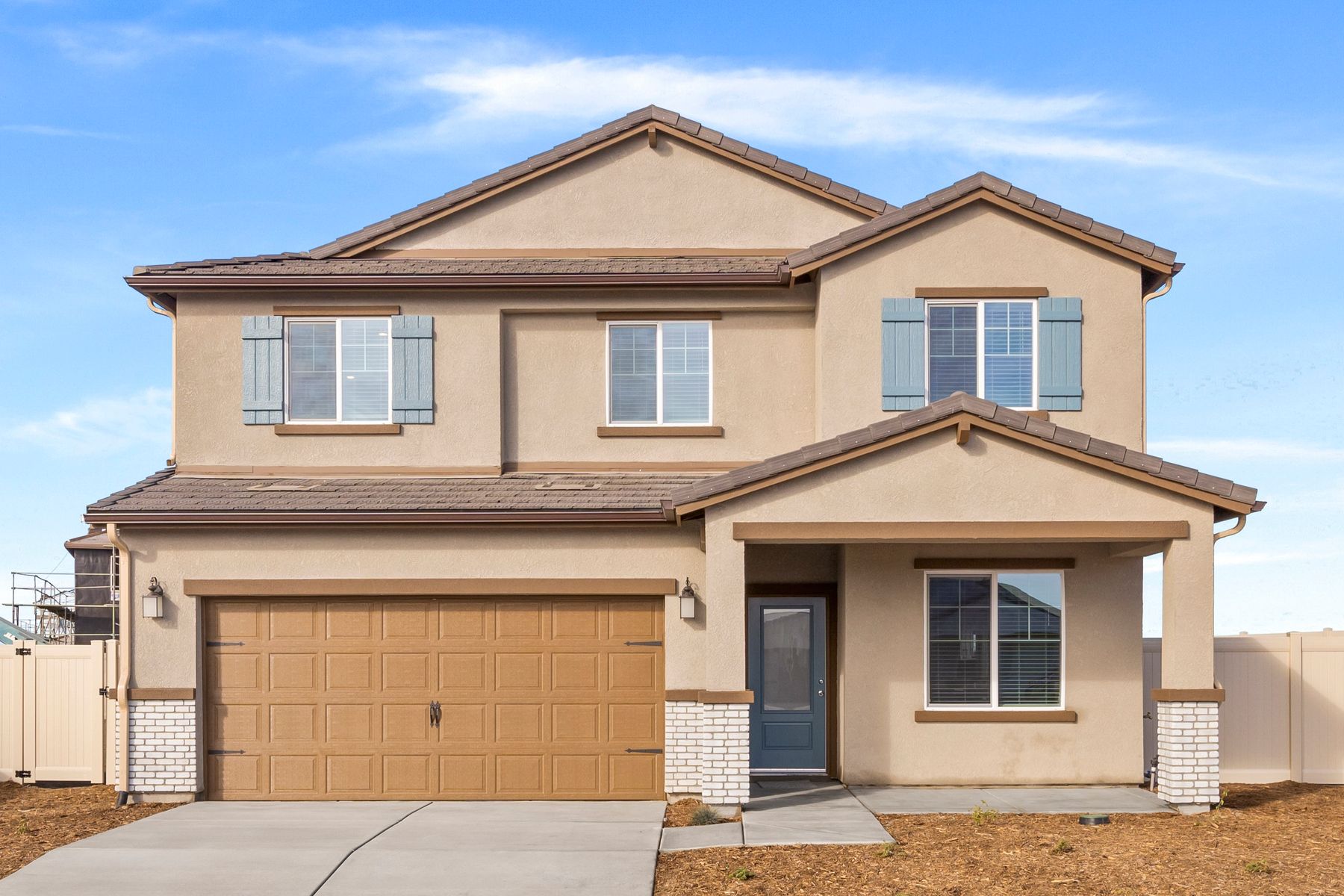 The Venice is a beautiful two story home with stucco.