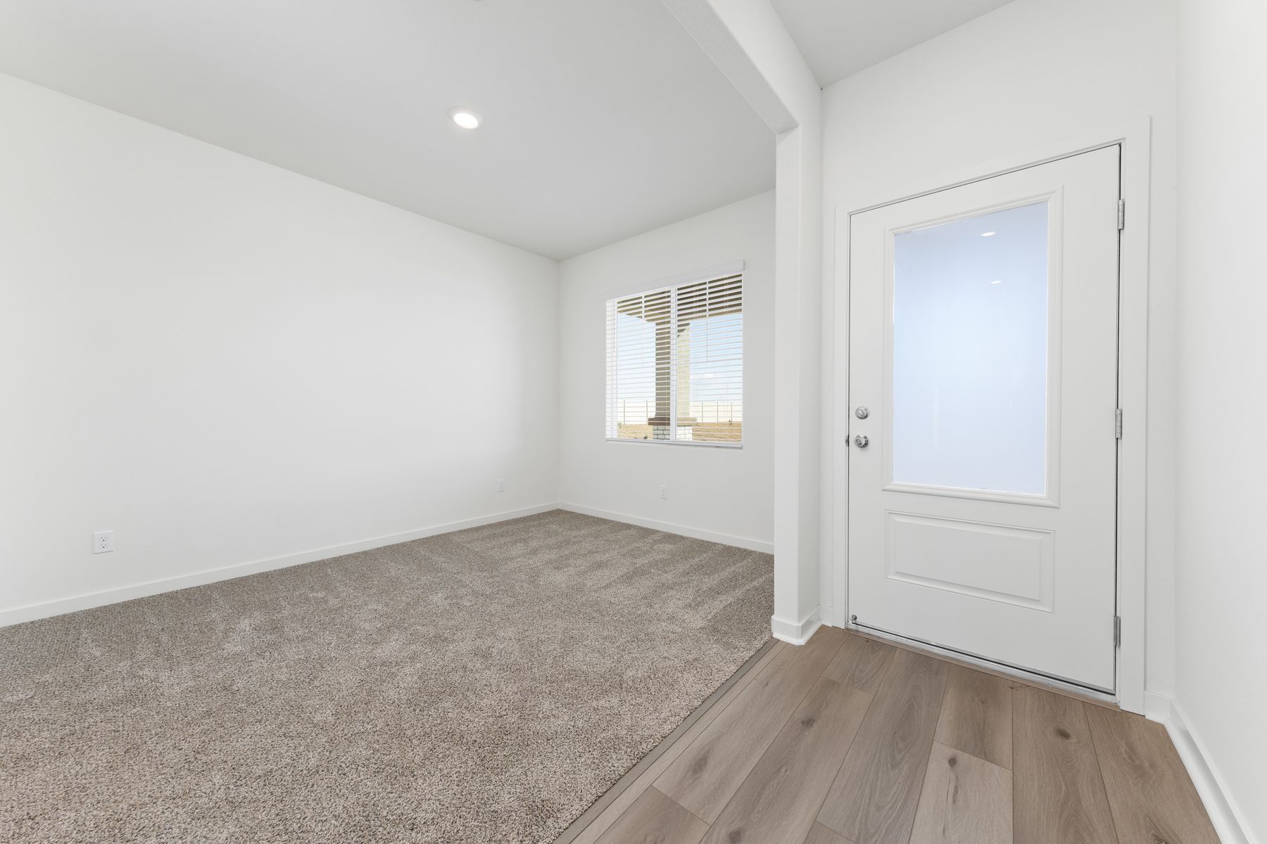 There is a dining room off of the foyer.