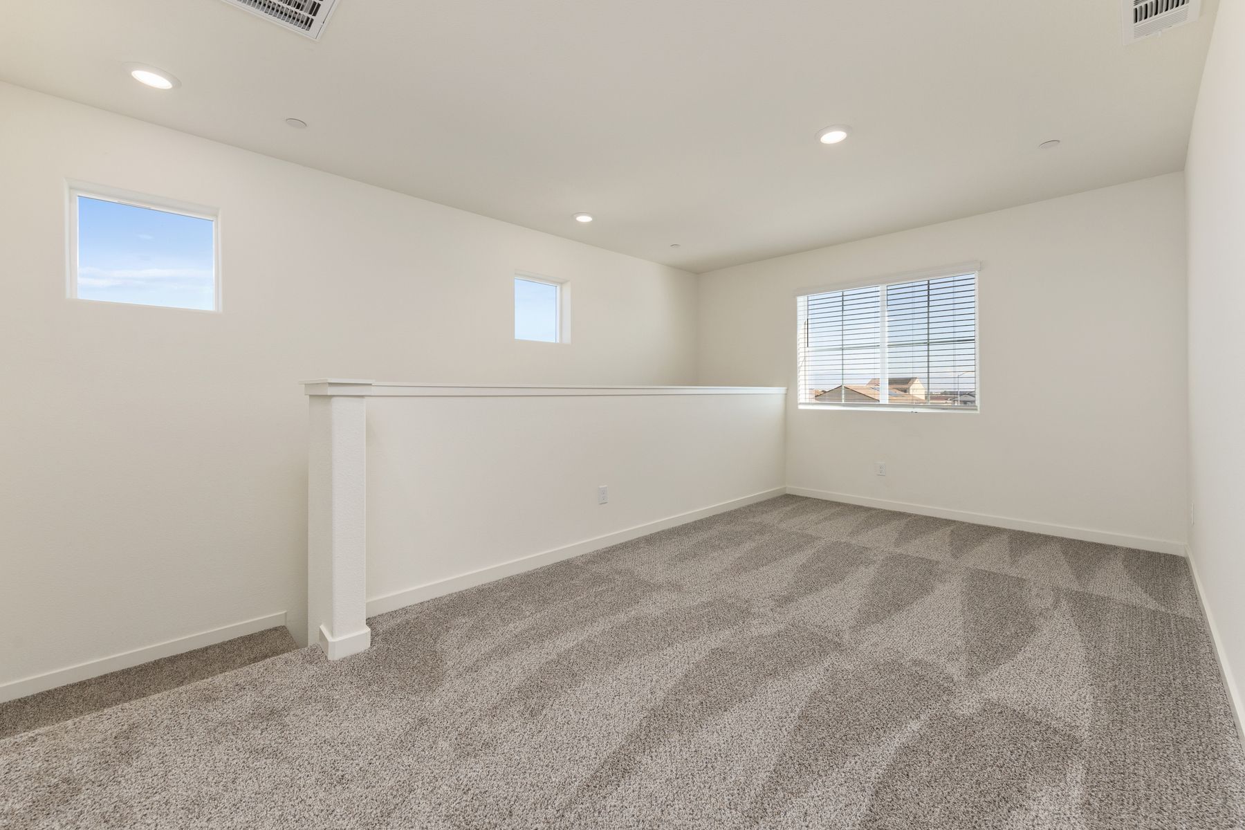 The game room is upstairs and has carpet. 