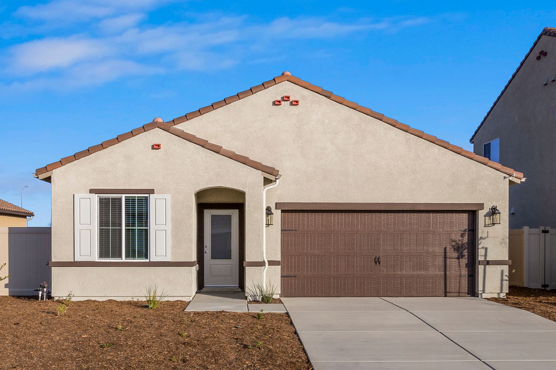The Avila is a beautiful single story home with stucco.