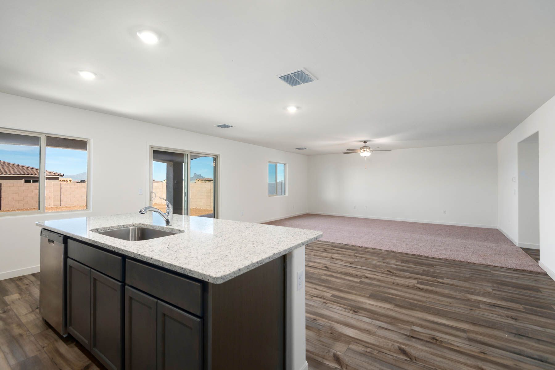 Enjoy time with friends and family in this spacious living area. 