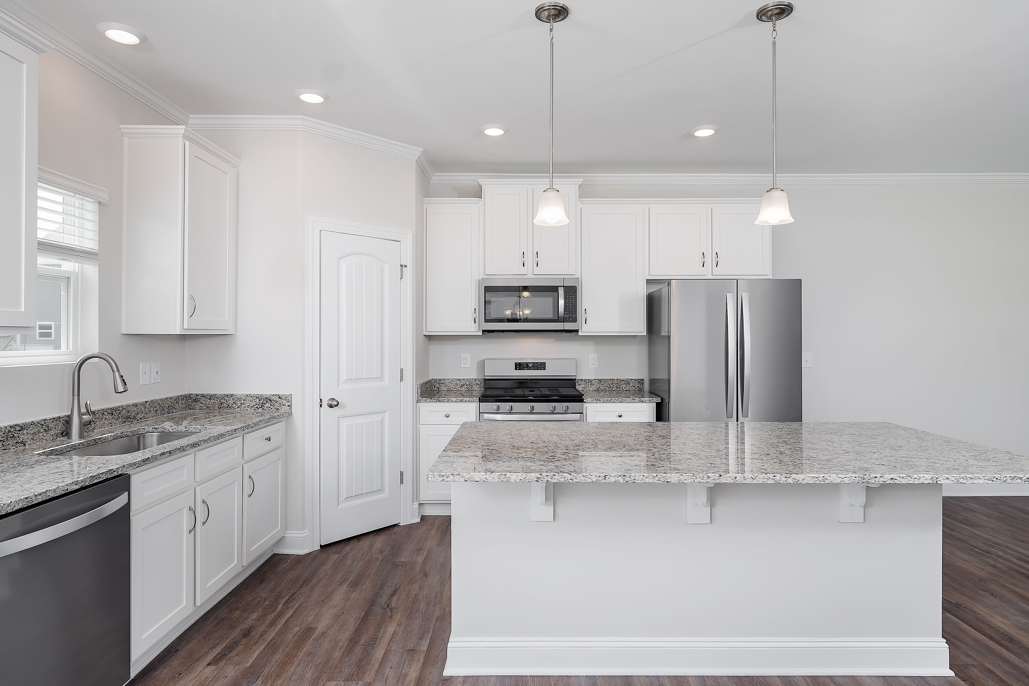 This kitchen features brand-new stainless steel appliances