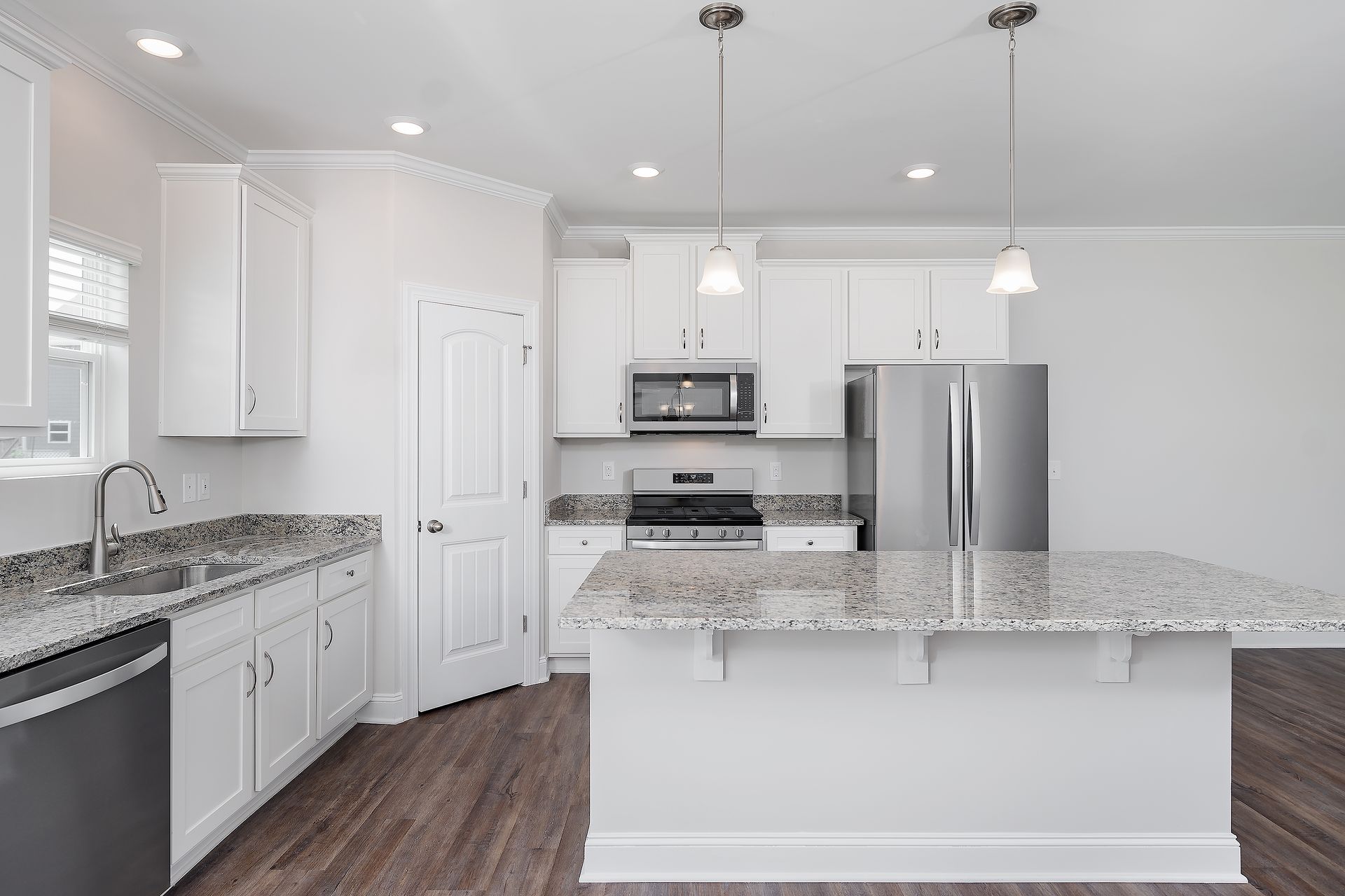 This kitchen features brand-new stainless steel appliances