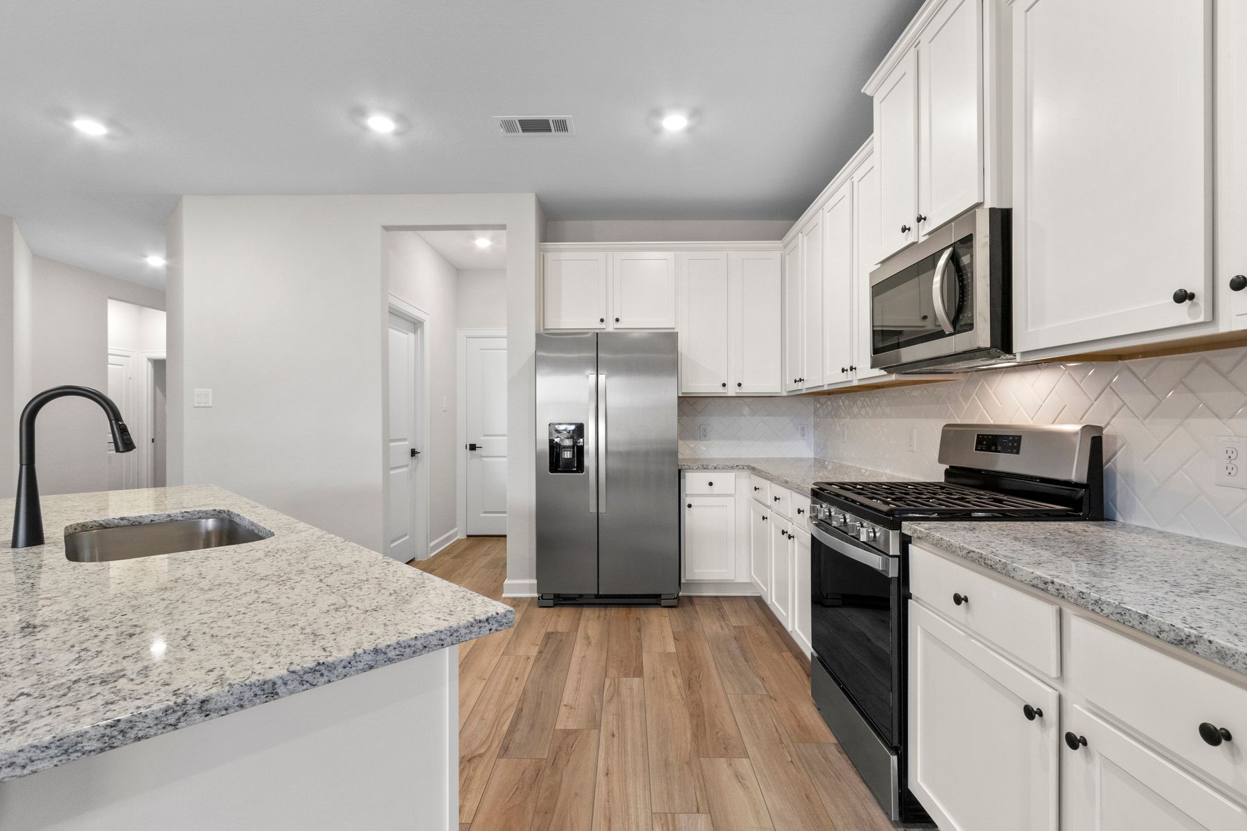The sunny kitchen is equipped with state-of-the-art appliances!