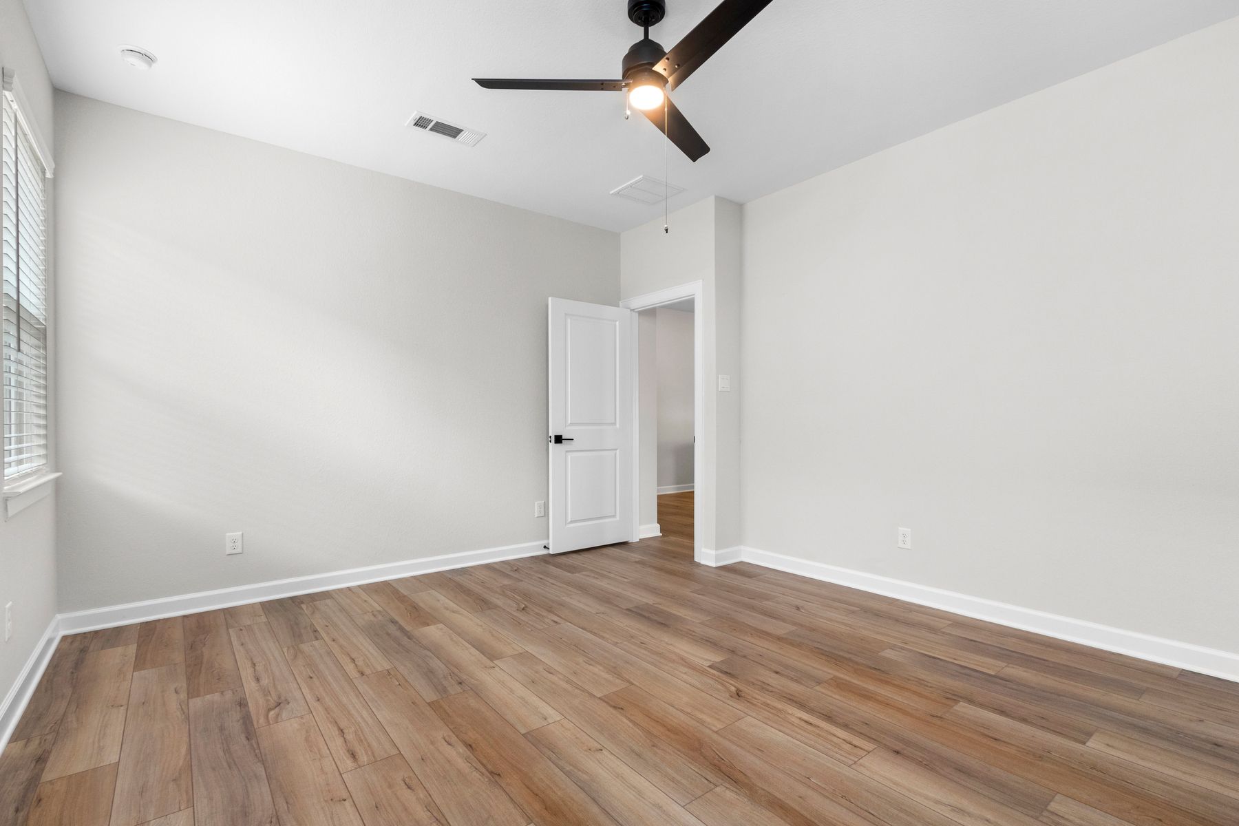 This master bedroom can fit anything you and your spouse need.