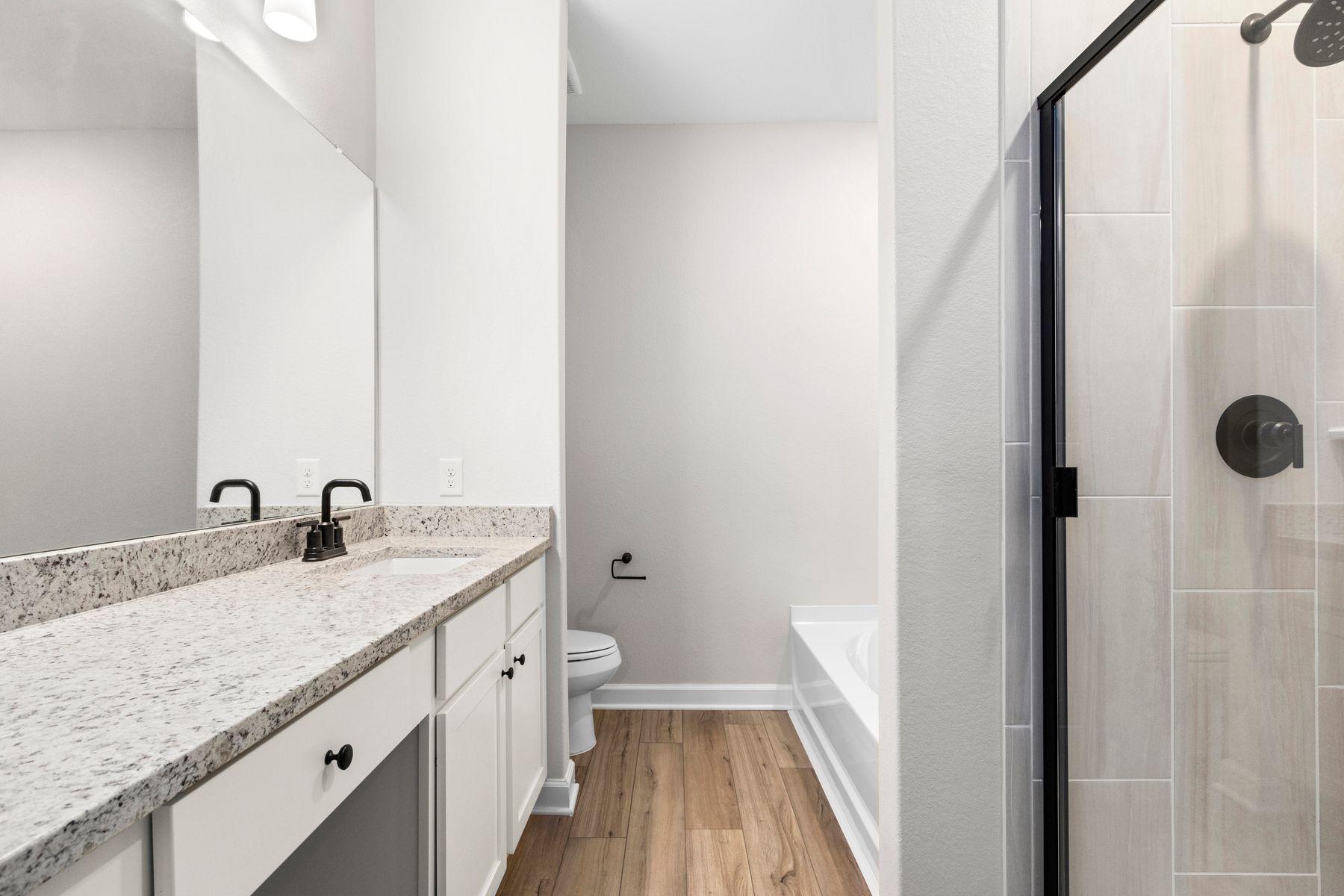 The master bathroom features a luxurious countertop.