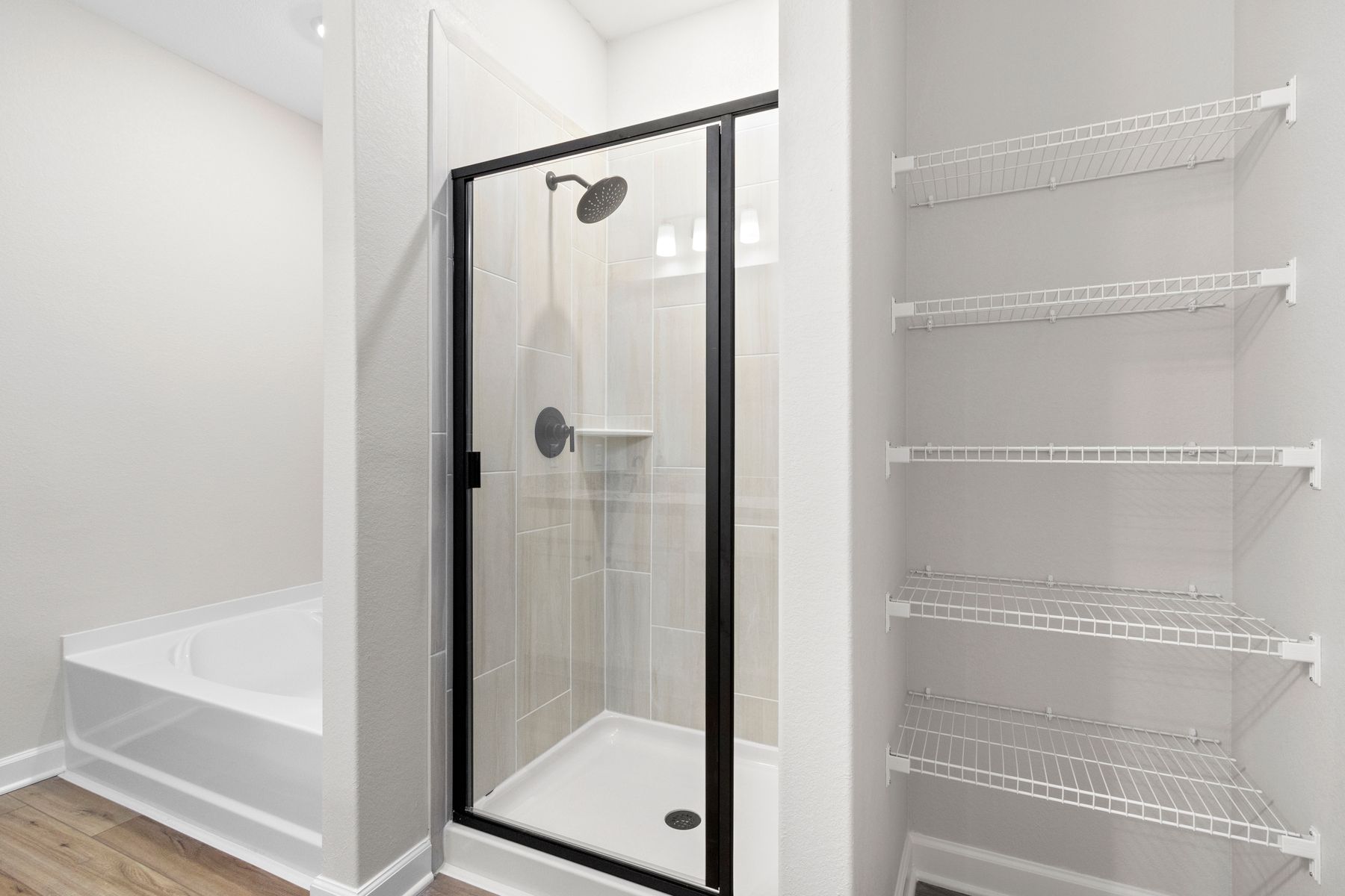 The master bathroom comes with a separate shower and bathtub!
