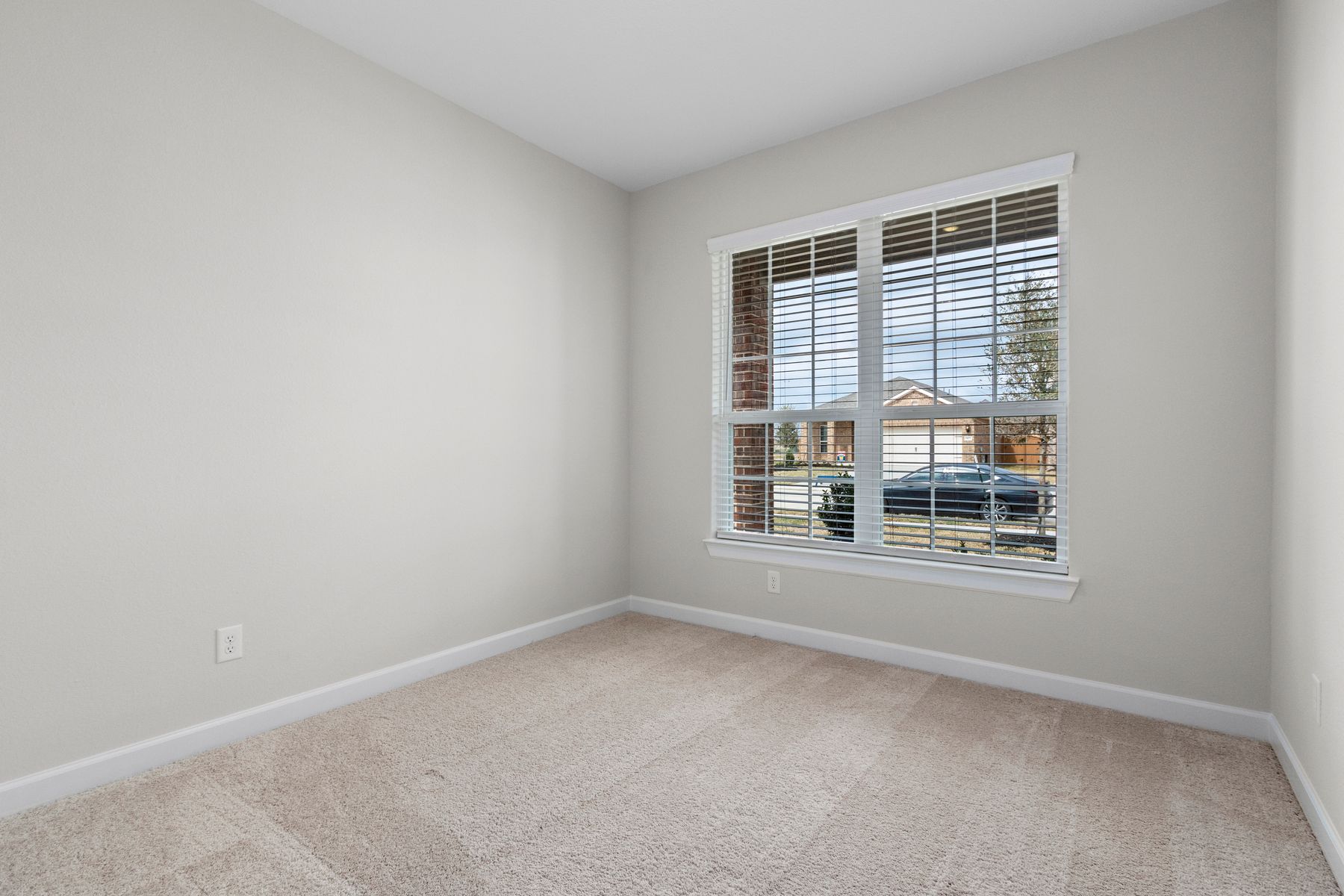 This additional room is perfect for a home office or exercise room. 