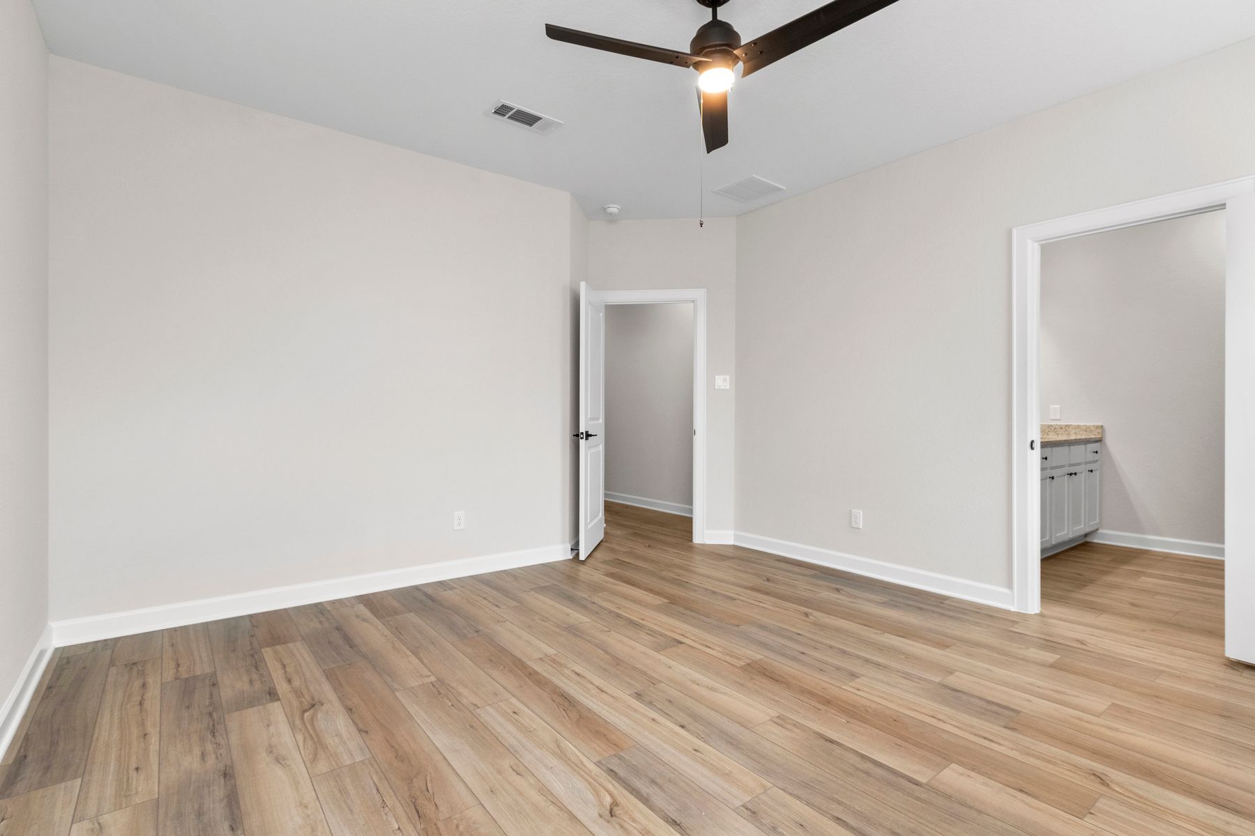 The master suite has a private master bath and large walk-in closet!