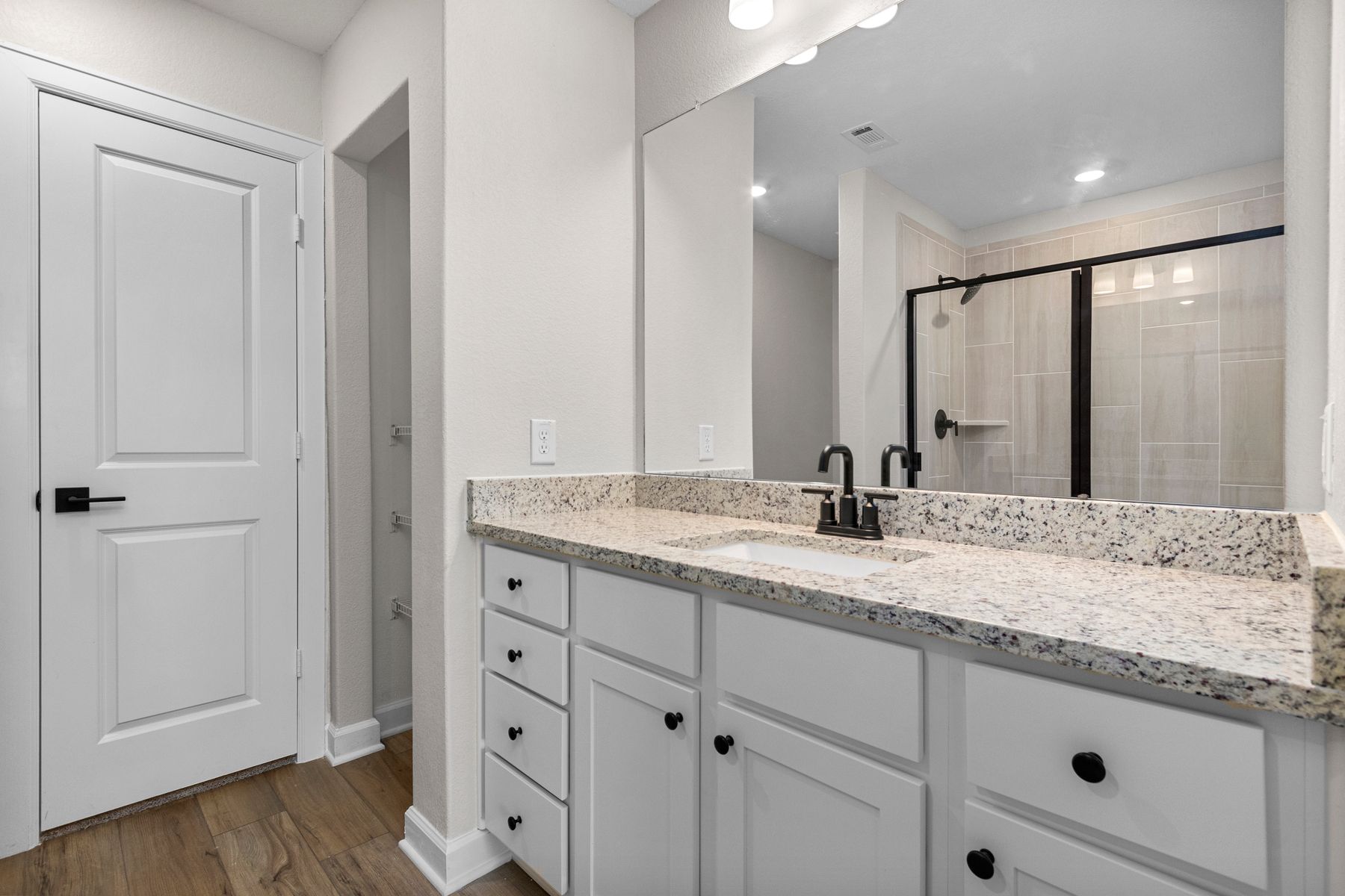 The master bath has a stunning vanity.