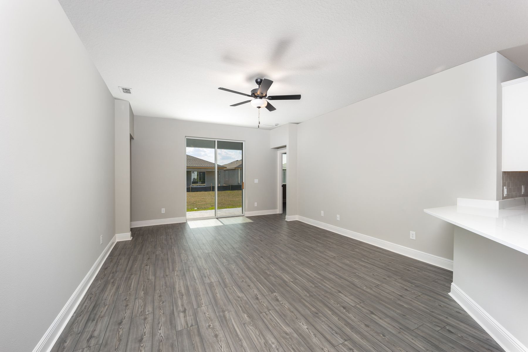 This family room opens to the backyard patio.