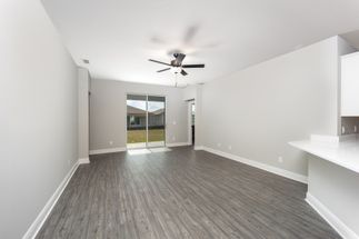This family room opens to the backyard patio.