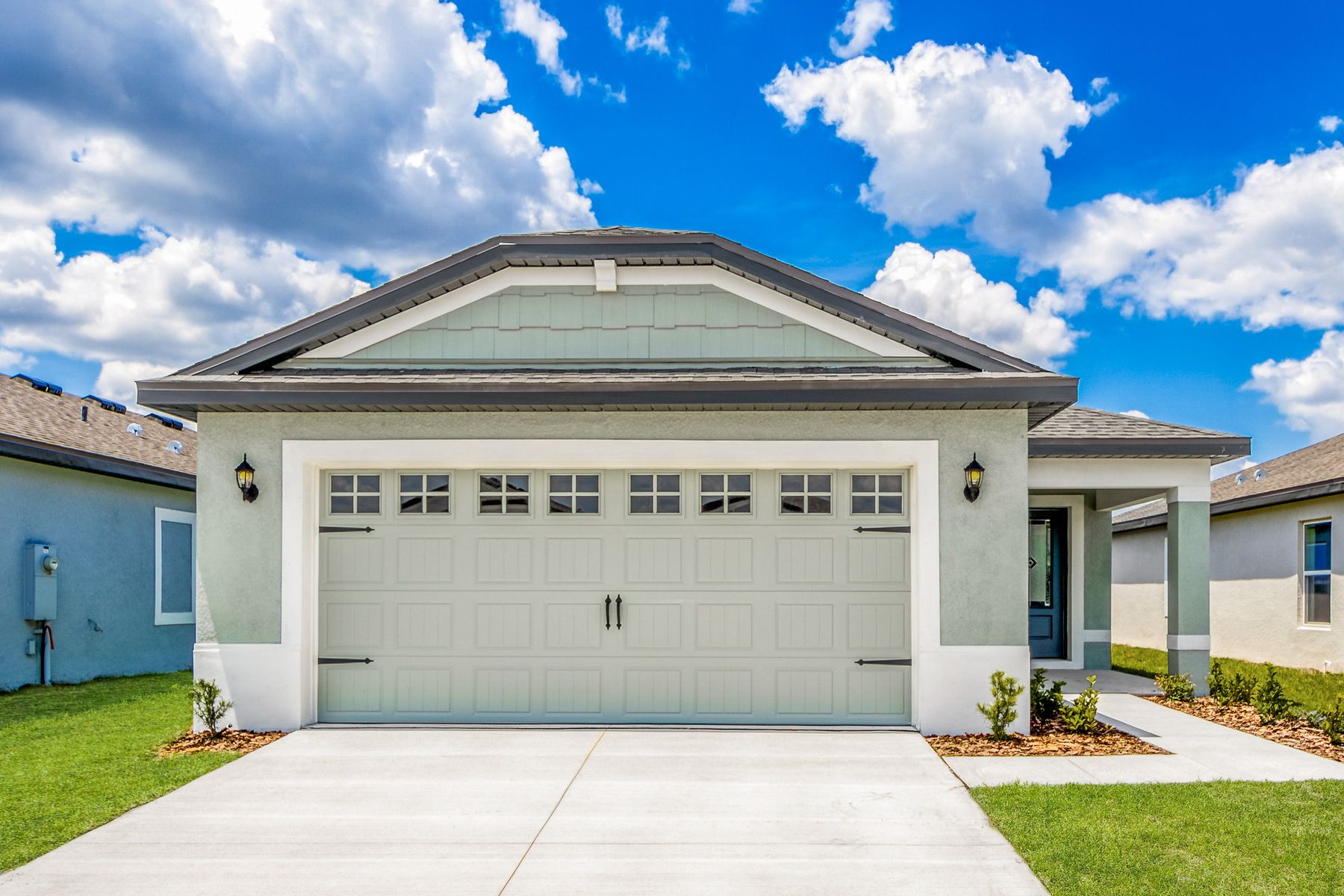 This home has a 2-car garage and gorgeous stucco exterior.