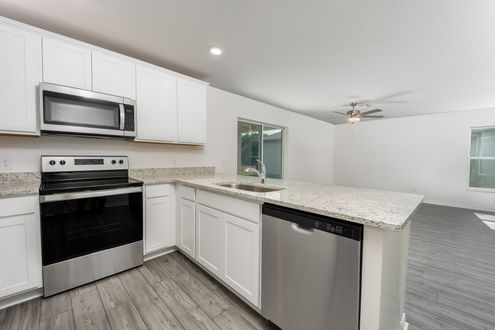 You will love this breakfast bar that overlook the living area.