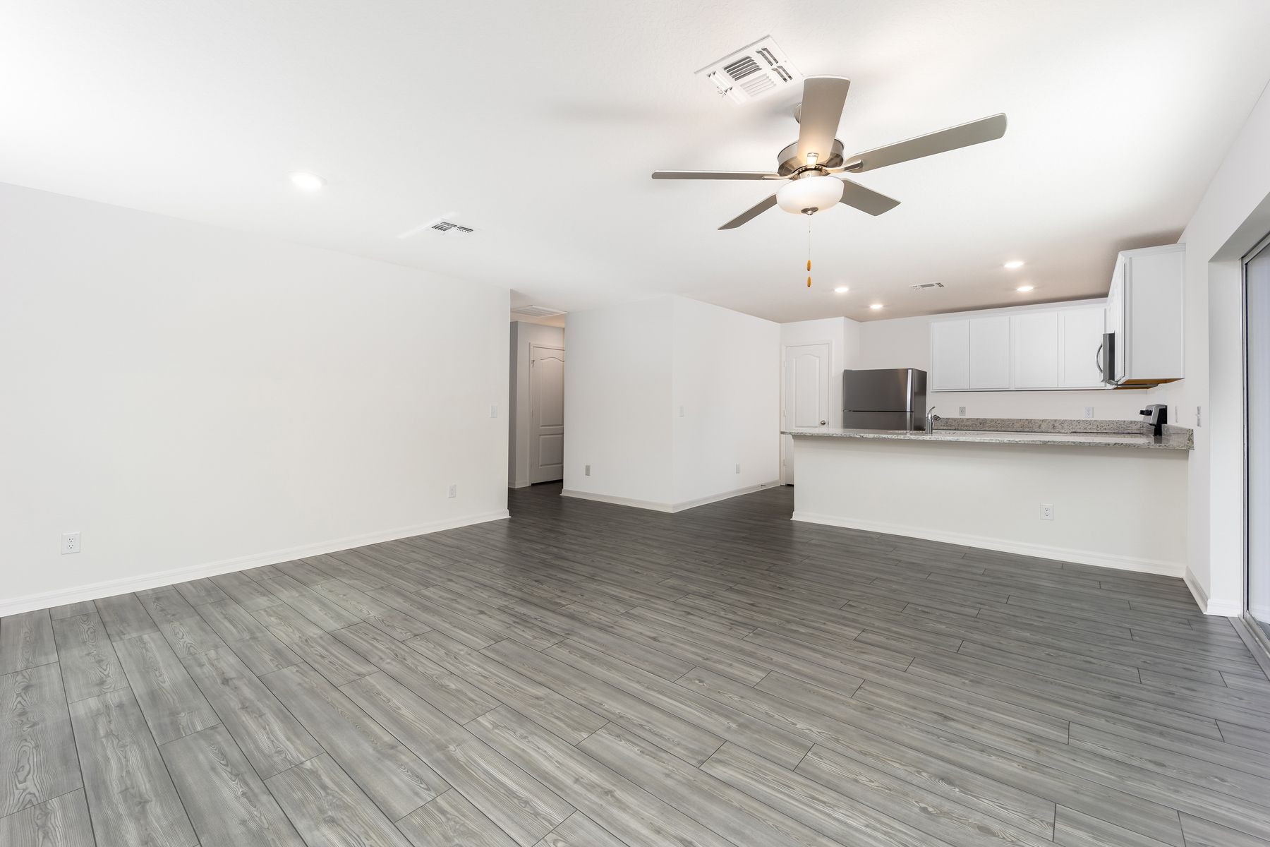 Enjoy entertianing family and friends with this open-concept living area.