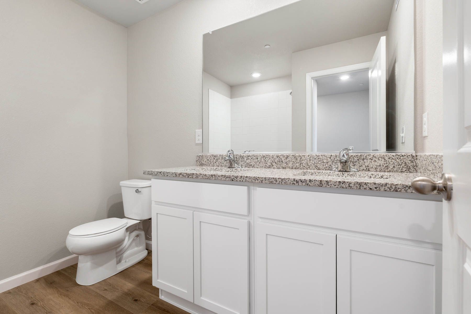 The secondary bedroom has a tub/shower combo.