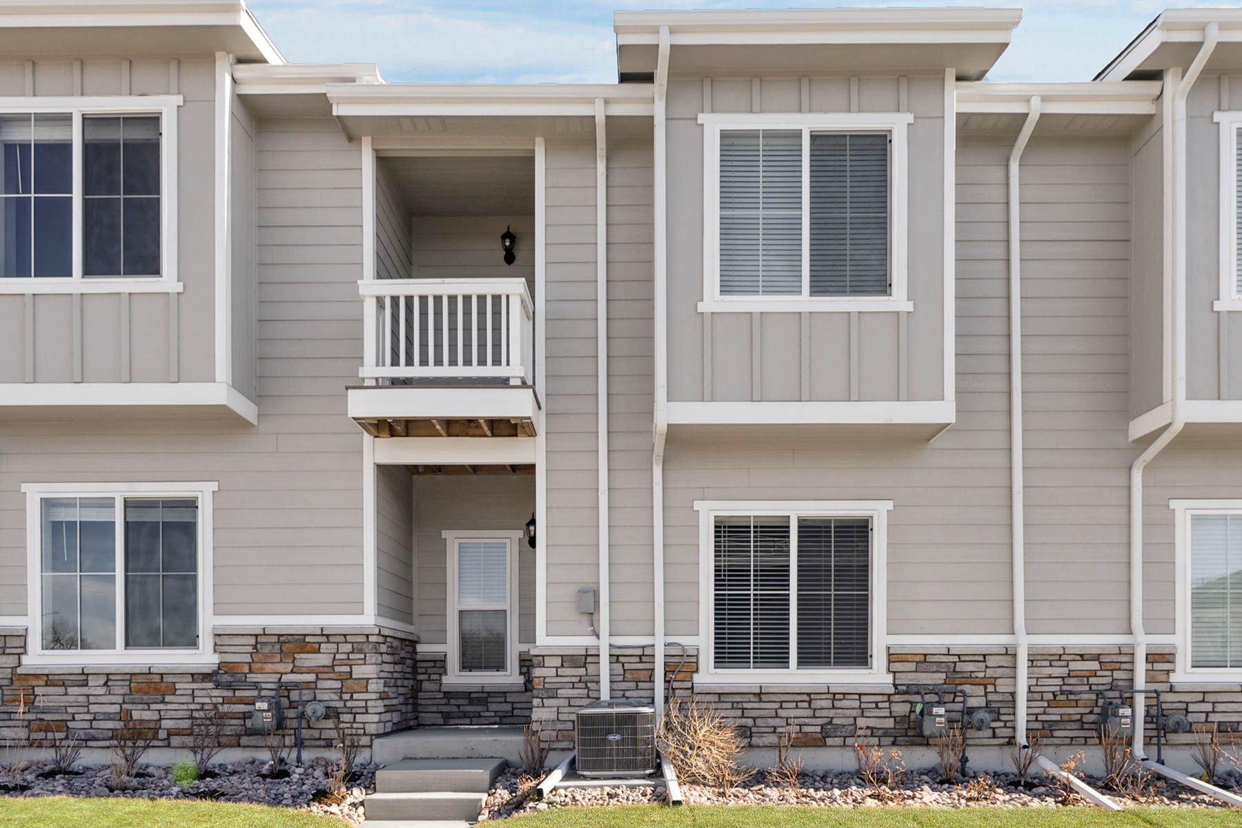 The Loveland is a beautiful two story home with siding and stone.