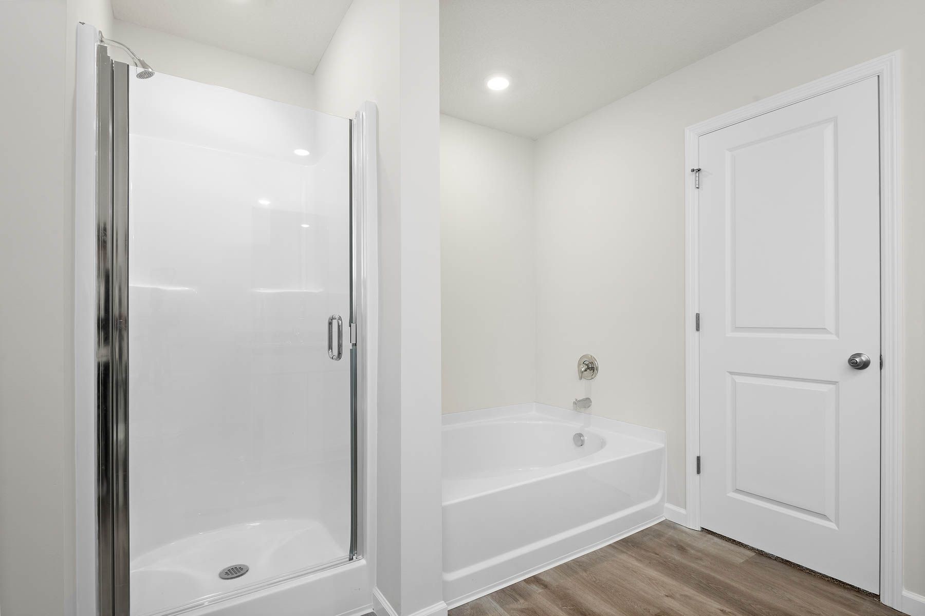 The master bathroom also has a step in shower and soaking tub.