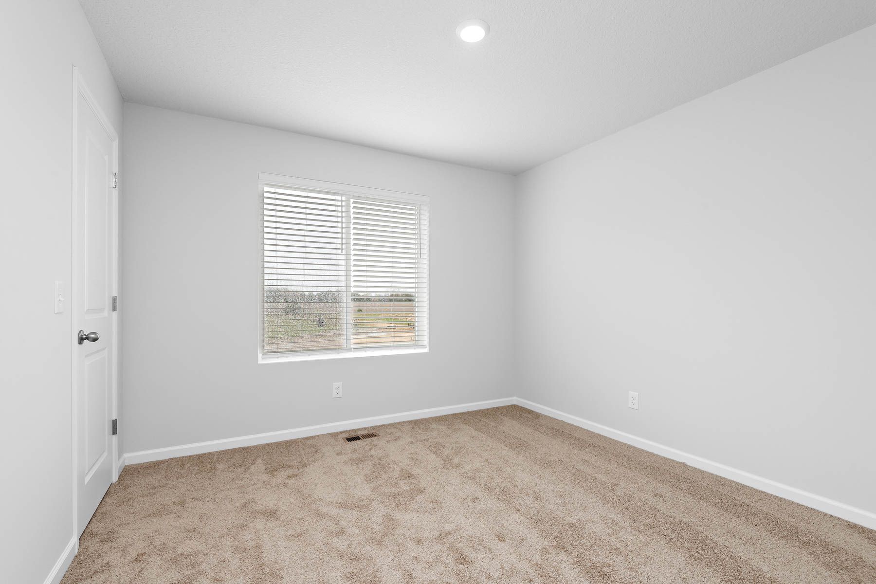 The secondary bedrooms have carpet.