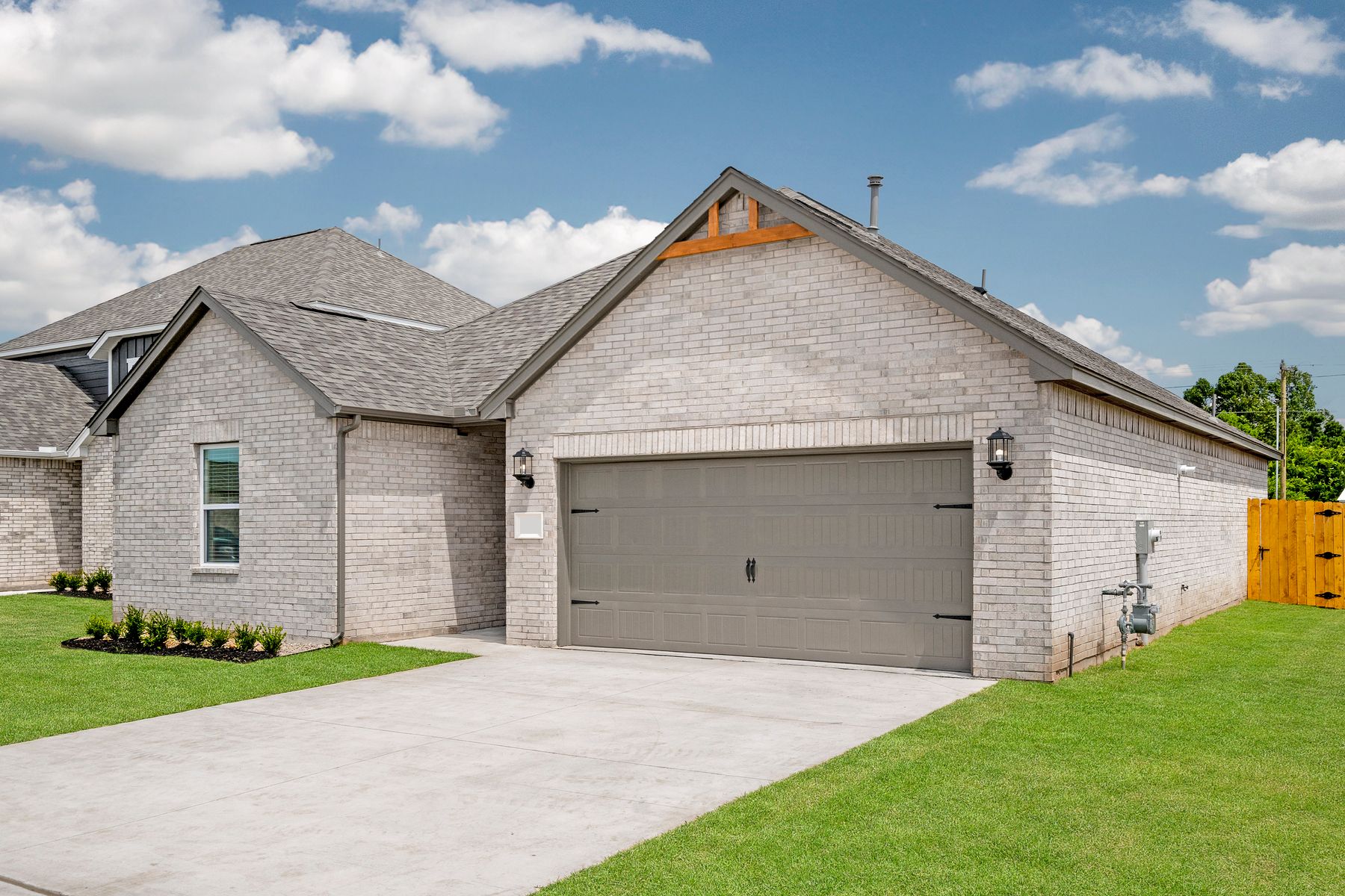 The Durant floor plan has wonderful curb appeal with its brick exterior and gorgeous front yard.