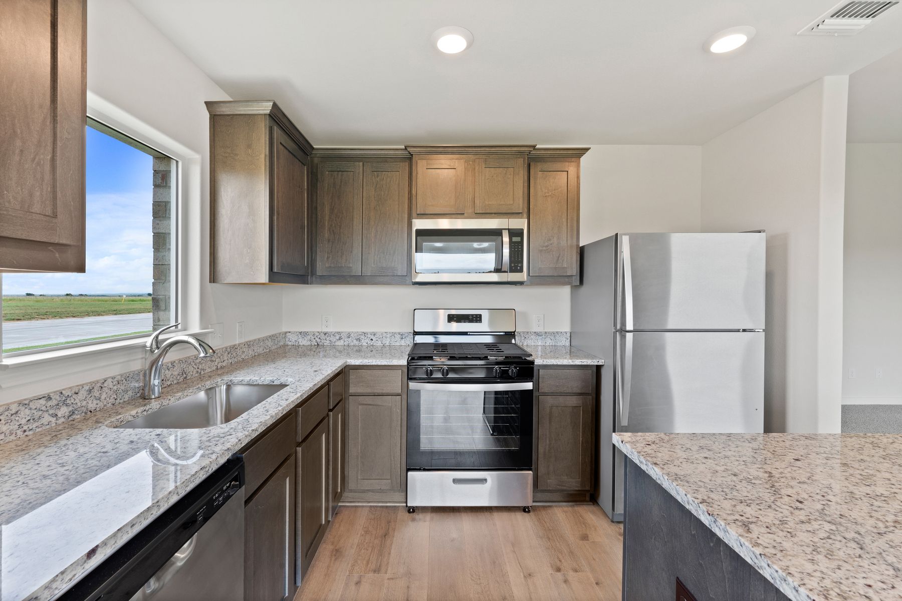 The kitchen has energy efficient appliances.