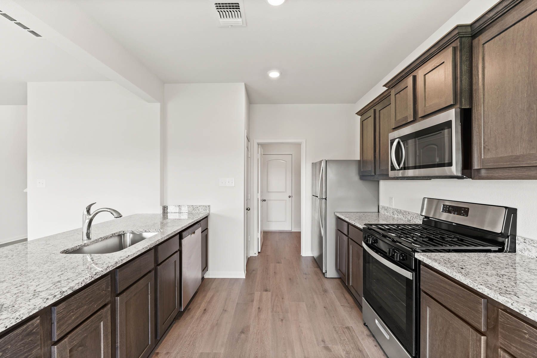 The kitchen has energy-efficient appliances.