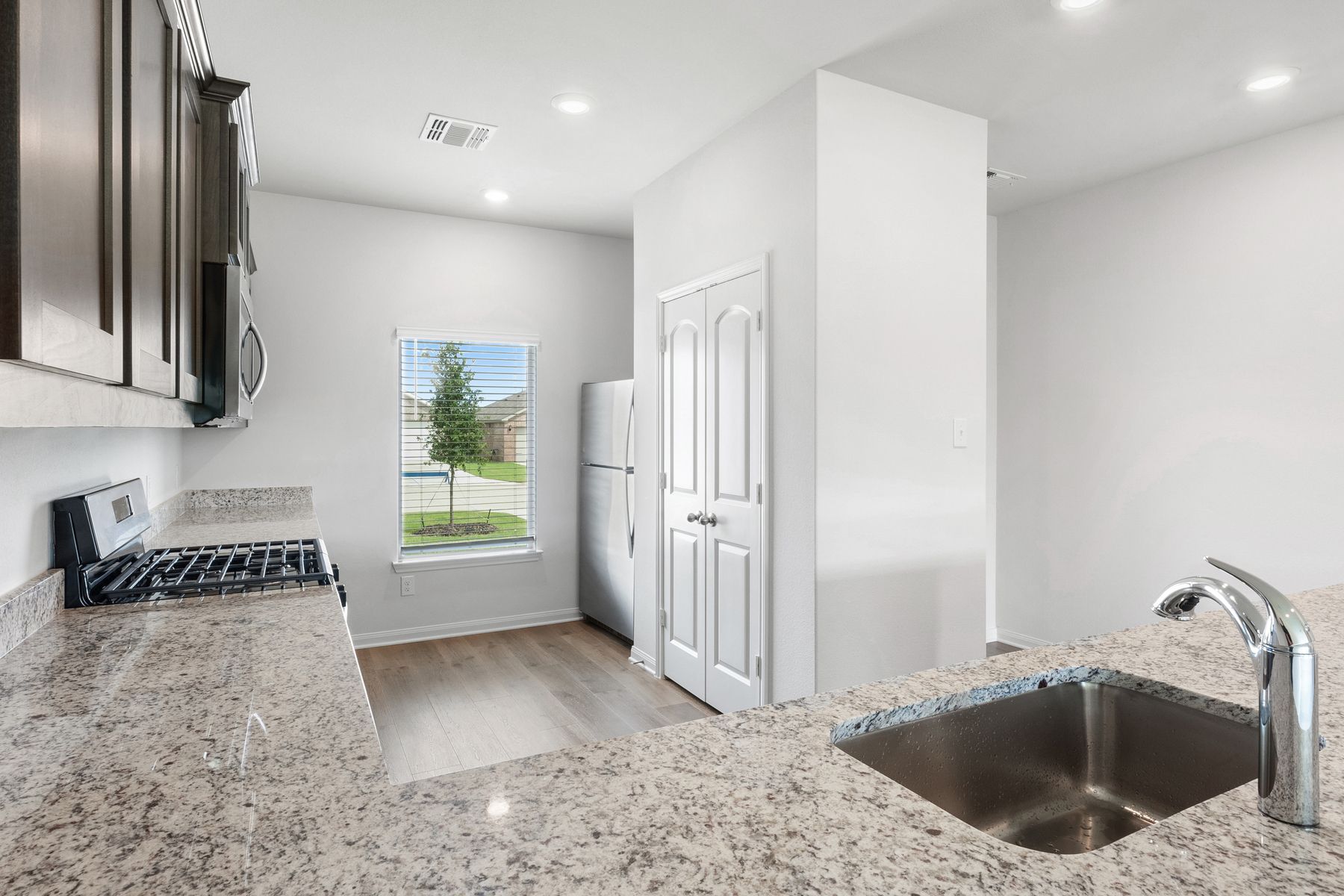 The kitchen has a wonderful window that lets in great natural light.