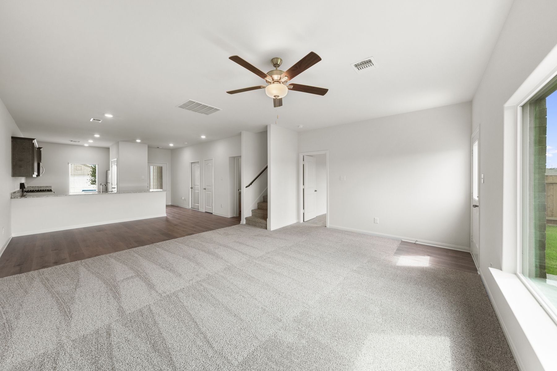 The spacious family room is perfect for everyday family living and hosting.