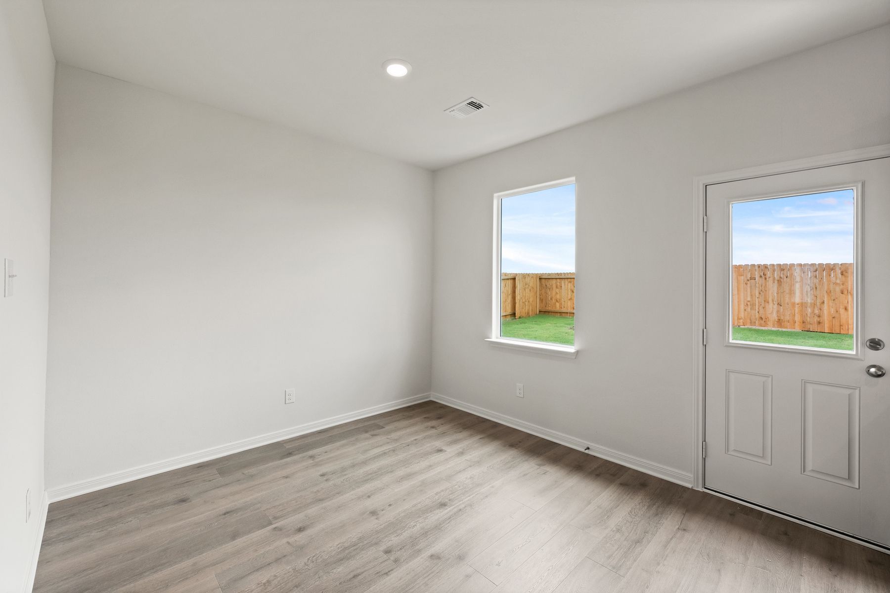 The dining room has a large window.
