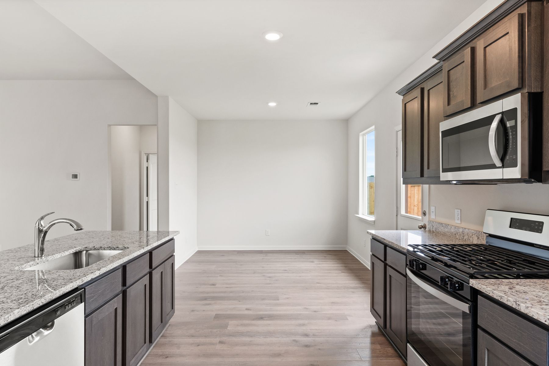 The dining room of sits right off of the kitchen.
