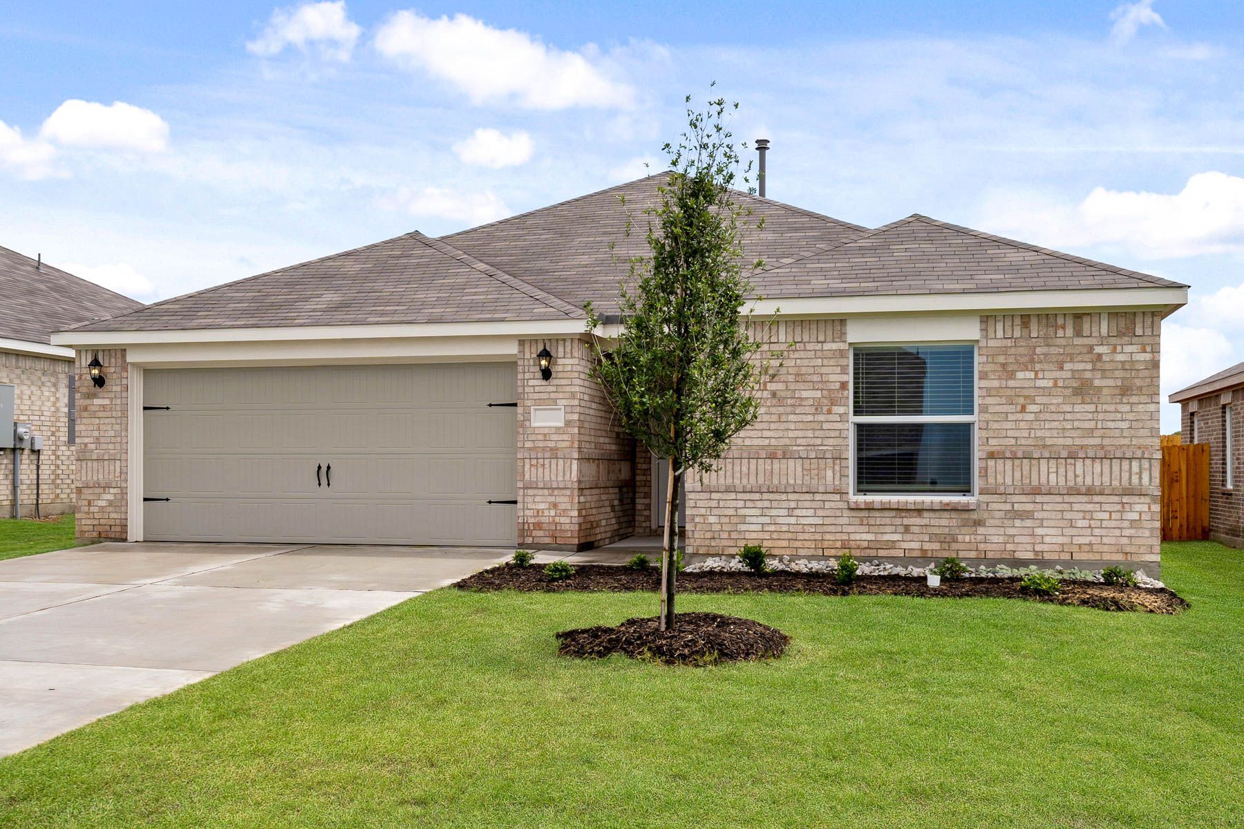 The Sabine is a beautiful one-story brick home.