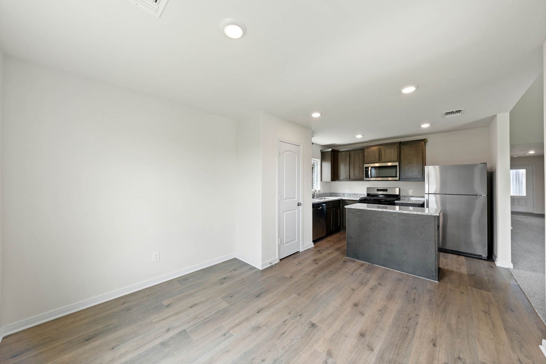 The dining room of sits right off of the kitchen.