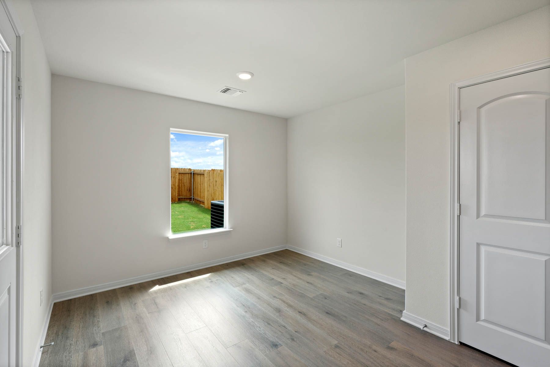 The dining room has a large window.